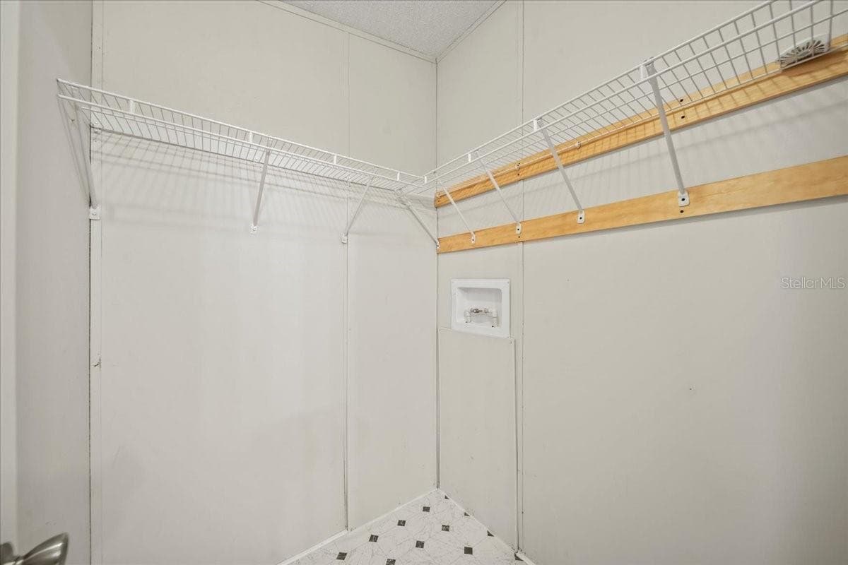Primary bathroom walk-in closet - 101 EDGEWOOD BLVD, LAKE WALES
