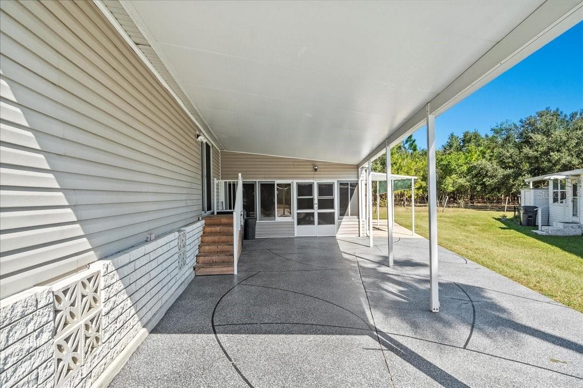 Entry to the sliding glass door - 101 EDGEWOOD BLVD, LAKE WALES