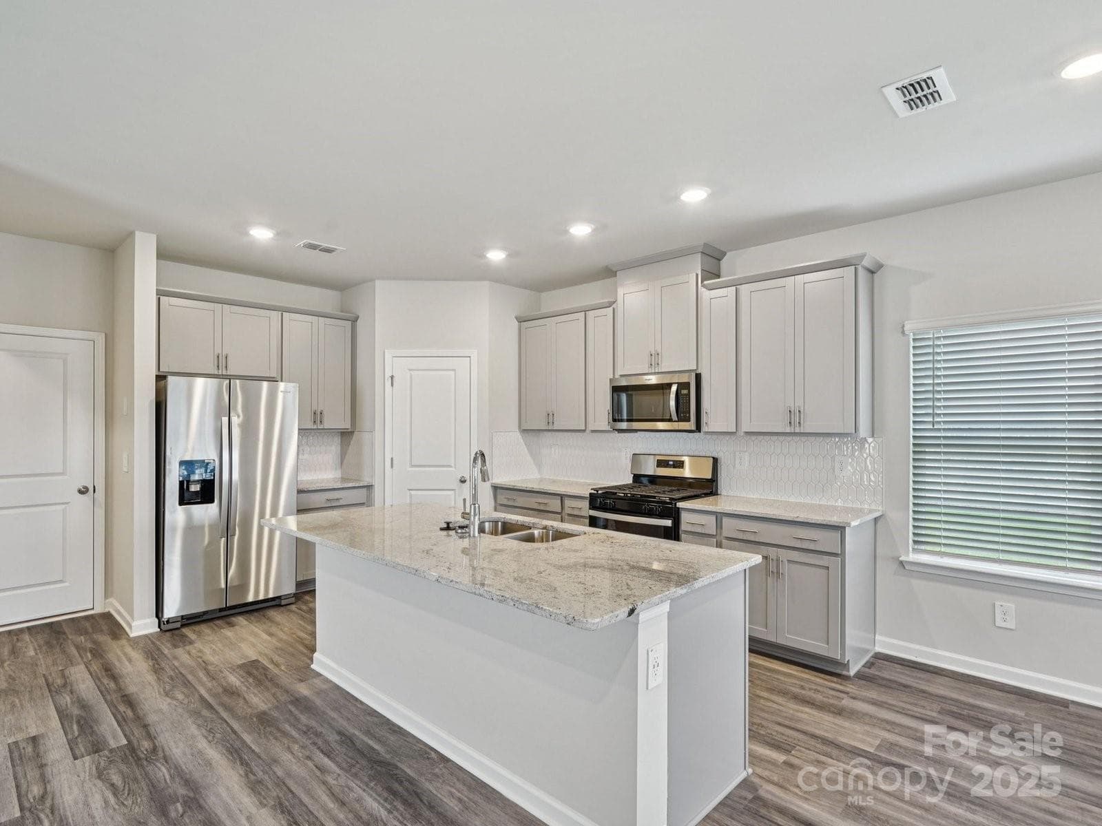 Photo is not of the actual home, but is an inspirational photo of builder’s model home and may depict options, furnishings, and/or decorator features that are not included - Gastonia