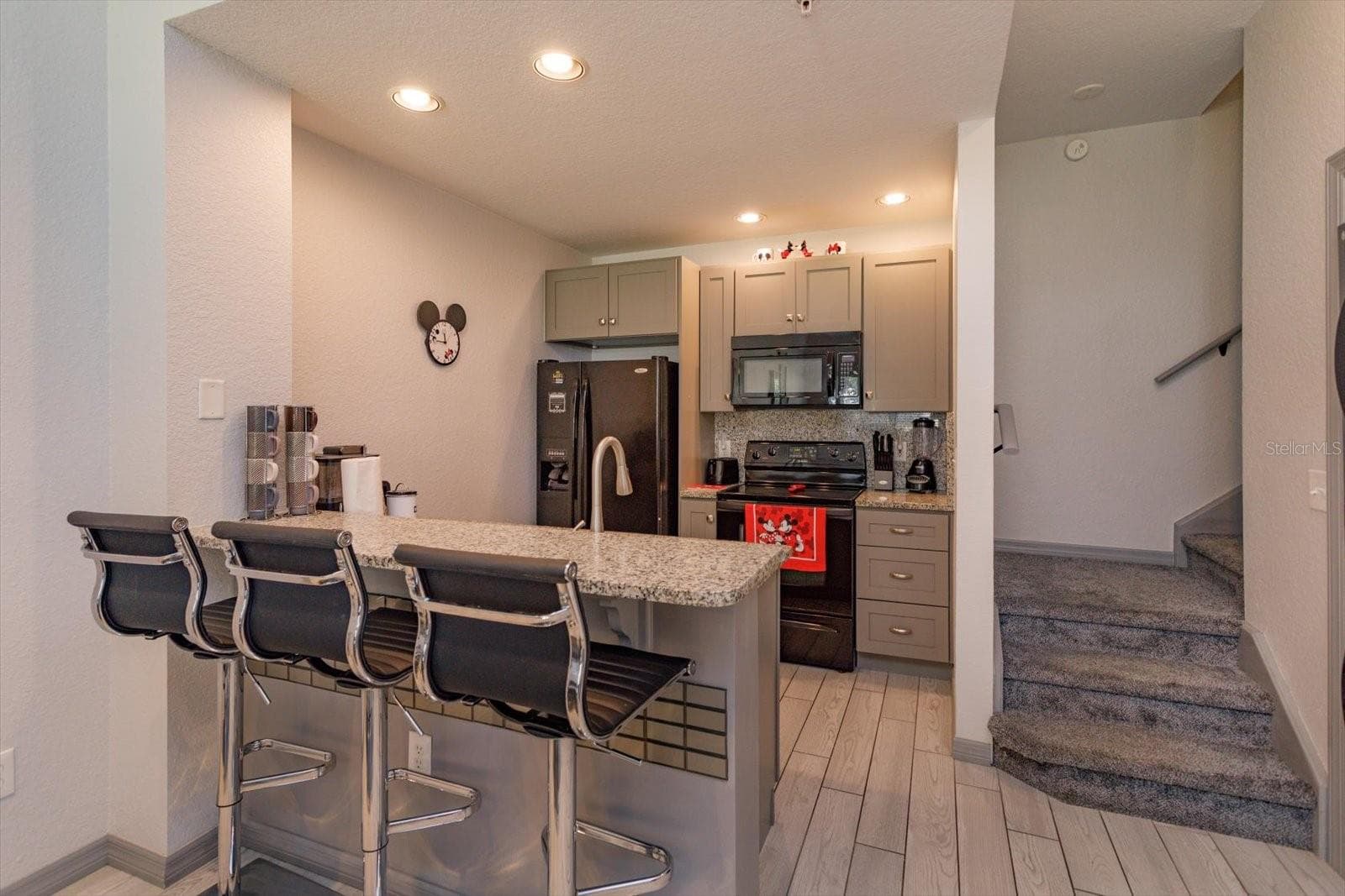 Kitchen and eat in bar - 2211 SAN VITTORINO CIR #103, KISSIMMEE