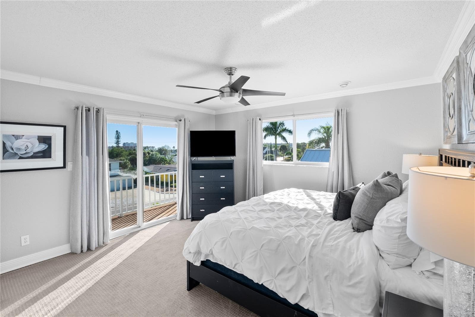 Guest room #3 with TV and balcony. - 255 46TH AVE, ST PETE BEACH