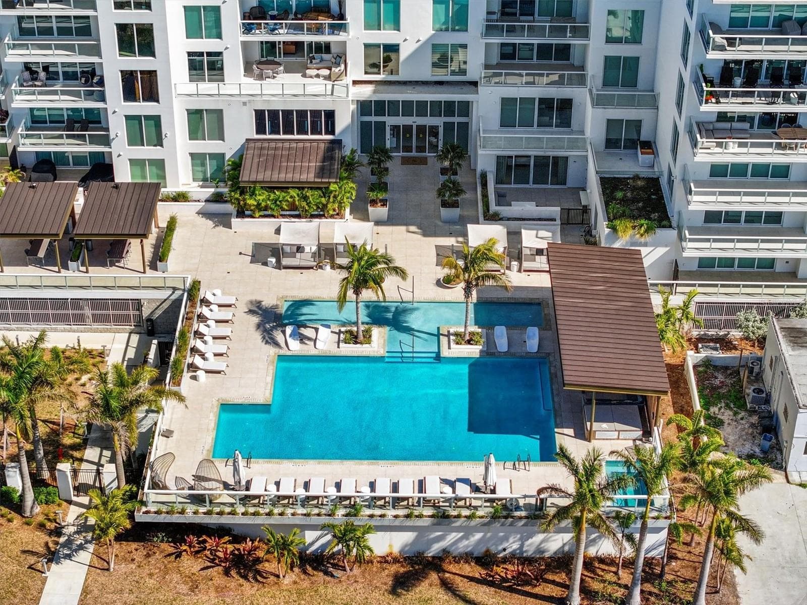 Aerial Pool View - 1020 SUNSET POINT RD #103, CLEARWATER