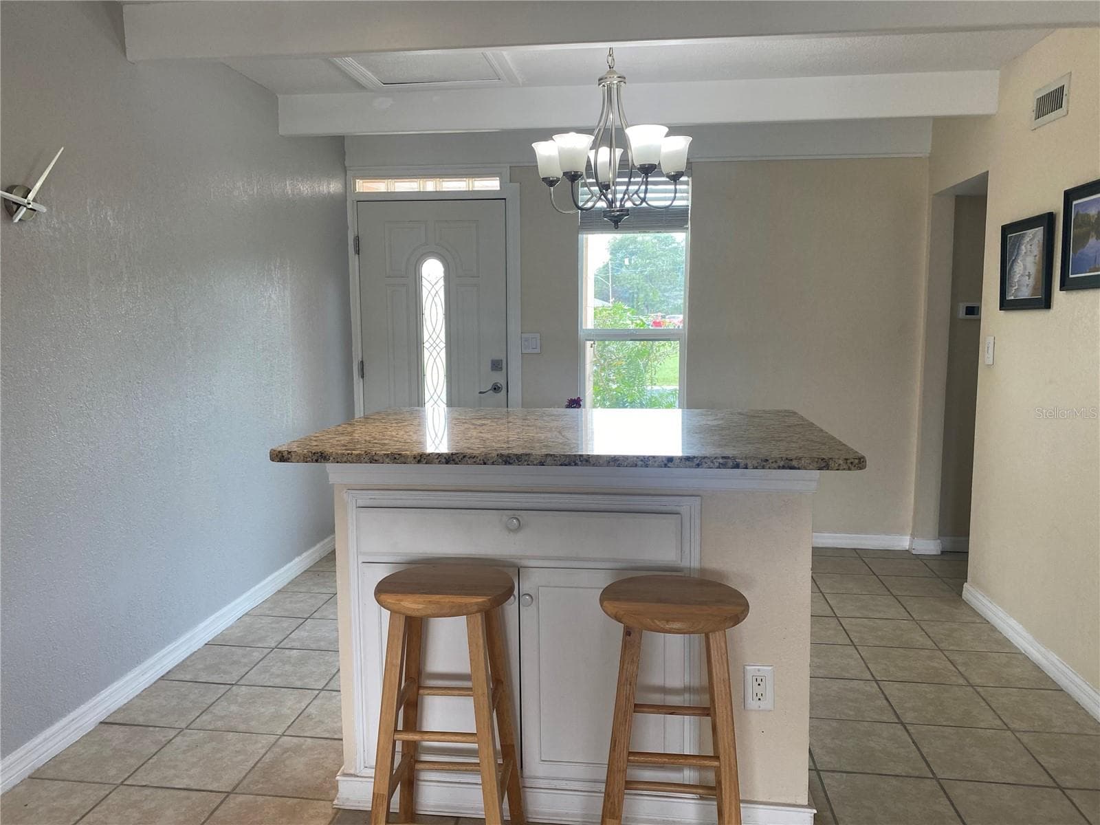 Breakfast bar looking to the front door. - 4409 CLUB CIR, LAKE WALES