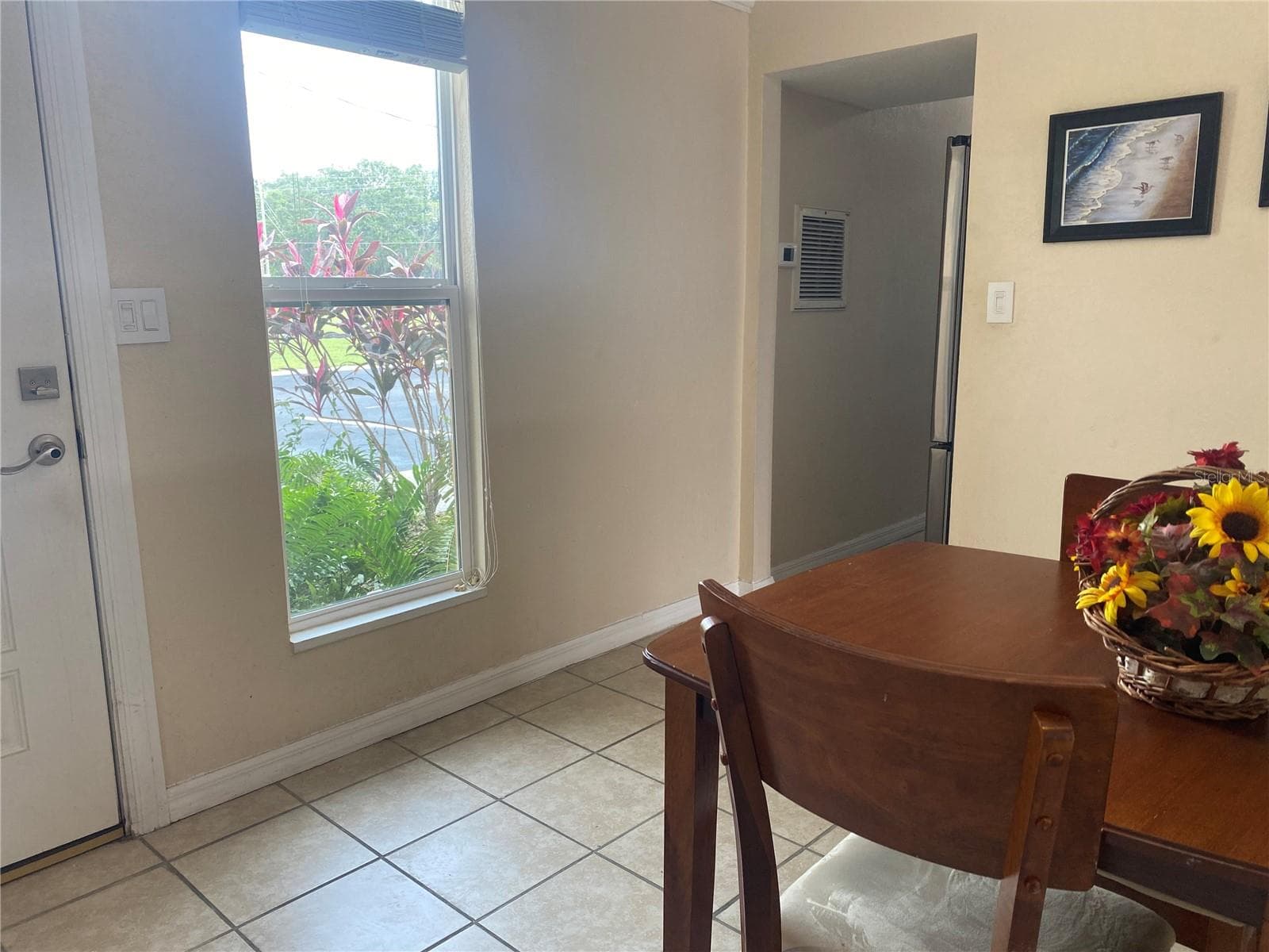 Dinette table is right off the kitchen. - 4409 CLUB CIR, LAKE WALES