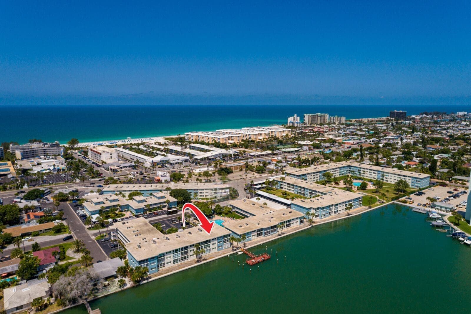 Walk to the Beach. Top floor waterfront unit on Boca Ciega Bay. - 6061 2ND ST E #55, ST PETE BEACH