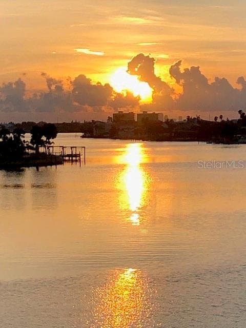 Sunrise with rain clouds on Boca Ciega Bay. - 6061 2ND ST E #55, ST PETE BEACH