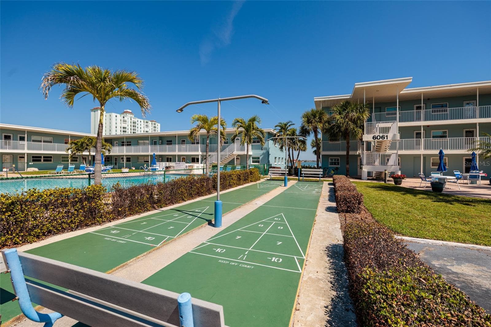 Shuffleboard courts next to the grilling area & unit. - 6061 2ND ST E #55, ST PETE BEACH
