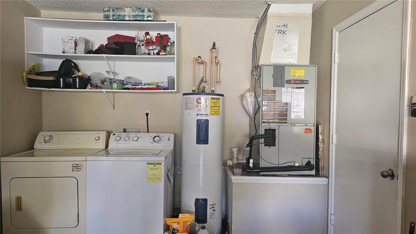 Laundry Room in garage - 9906 SURREY RIDGE RD, ORLANDO