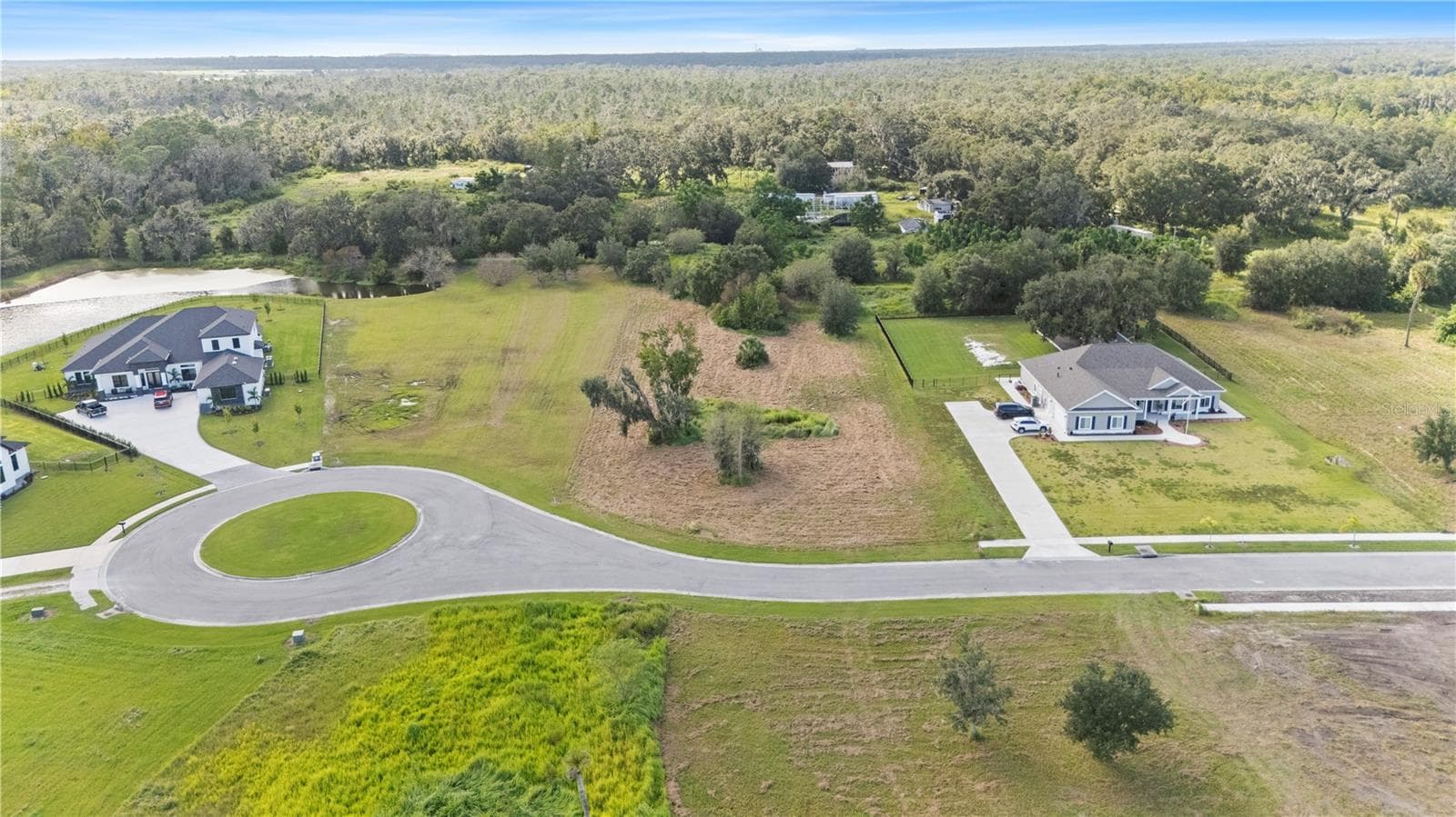 Only 18 Executive homesites in this cozy gated neighborhood - 15323 FISHHAWK HEIGHTS RUN, LITHIA