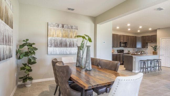 Model home - actual features may vary. - 808 SUNSHOWER DR, LADY LAKE