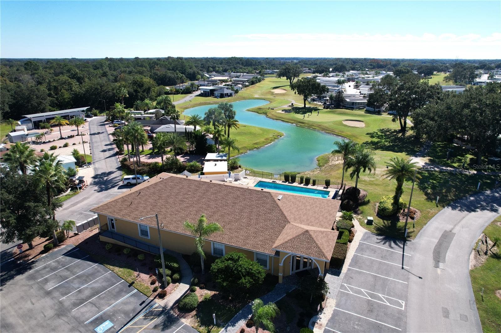 Regal Pointe Clubhouse & View of the pond on the golf course - 2738 ST GEORGE DR, DAVENPORT