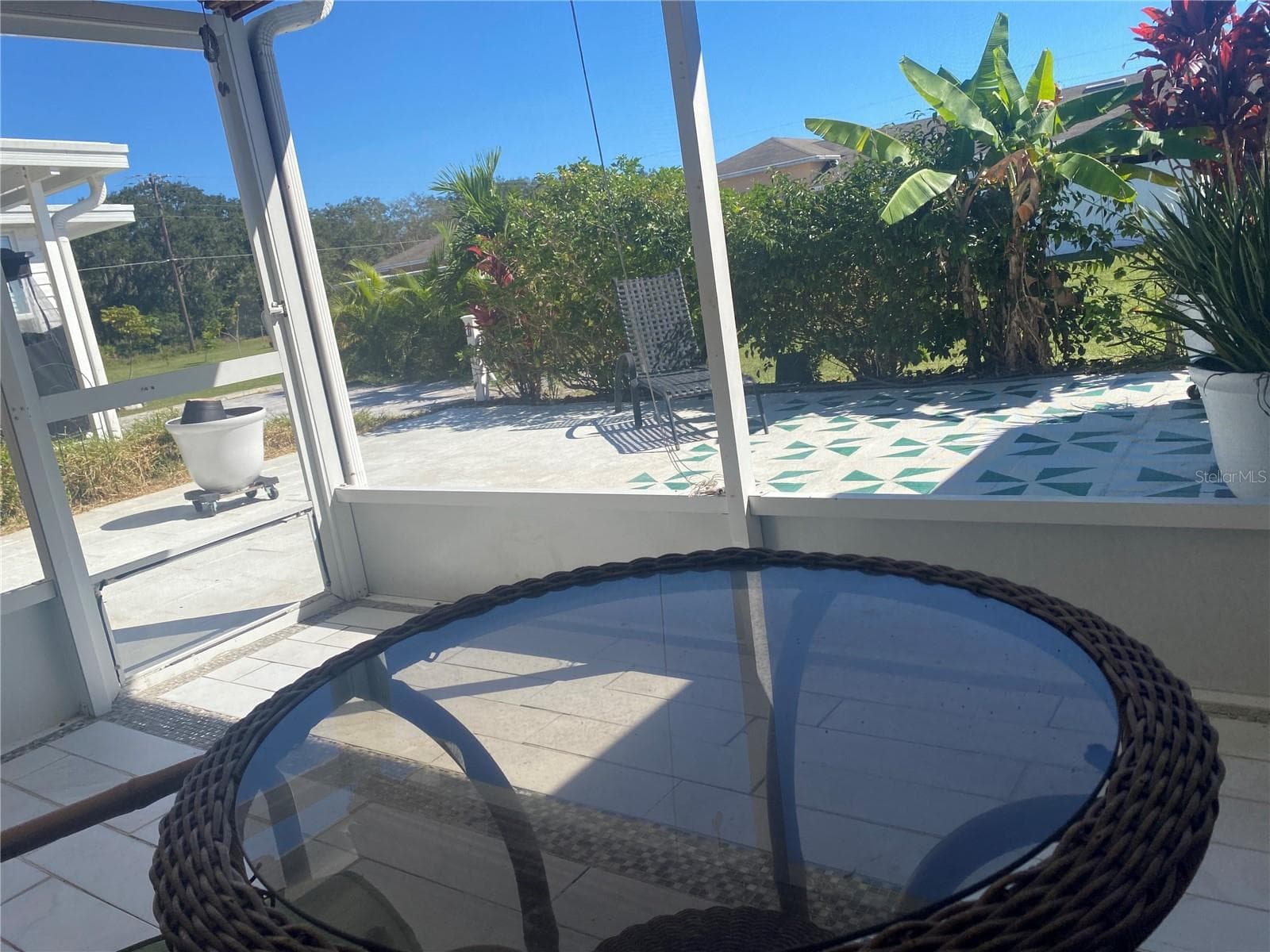 Back screened porch opens to your courtyard. - 4409 CLUB CIR, LAKE WALES