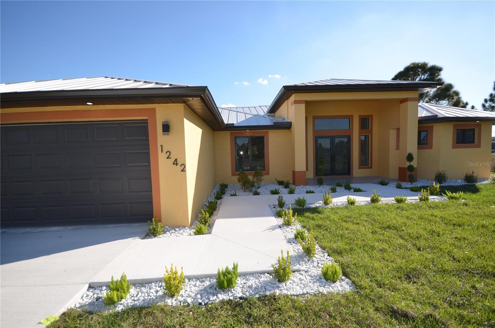 Single Family Residence at 1242 HATHOR ST E, LEHIGH ACRES, photo 2 of 49