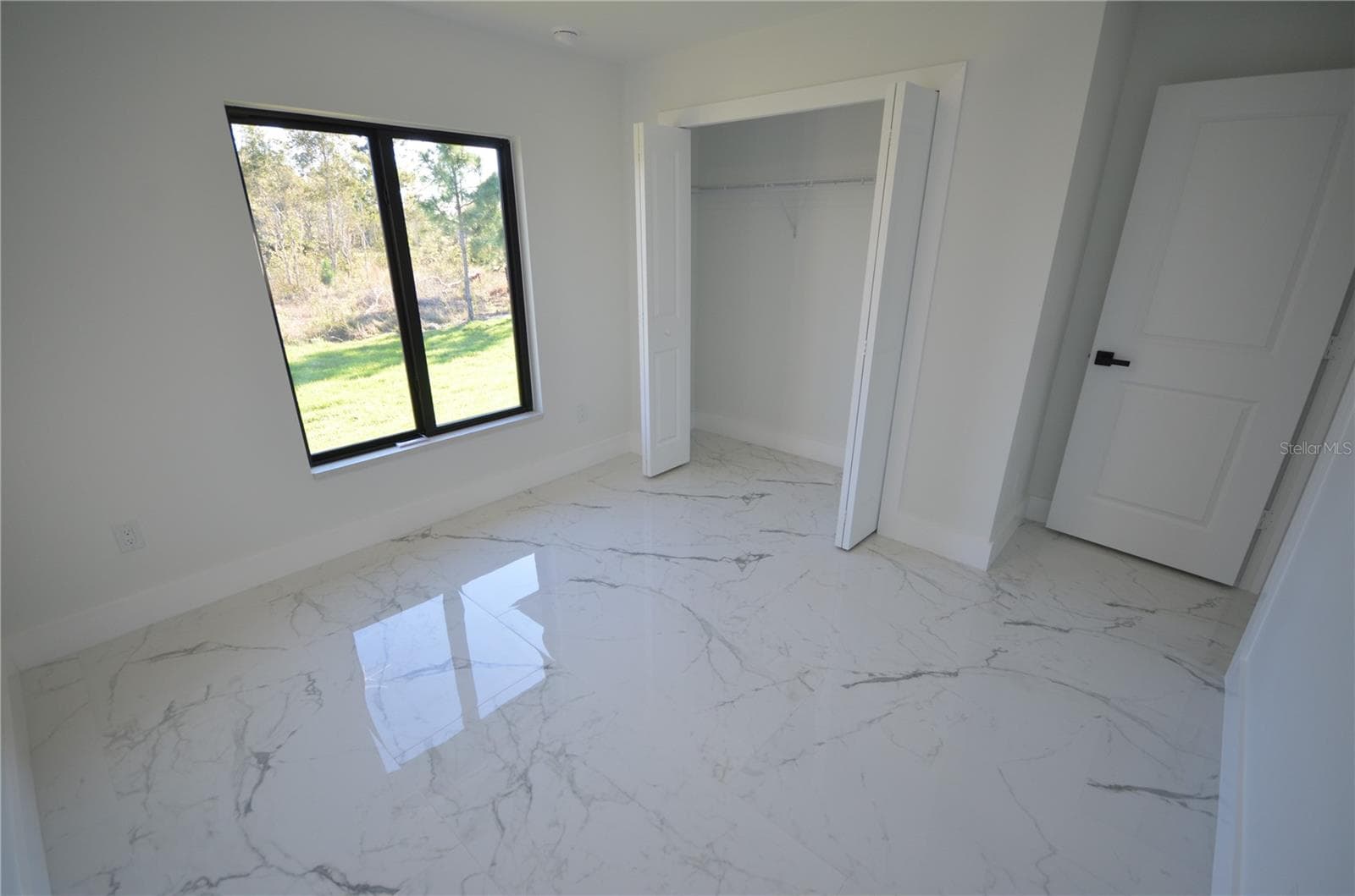 Single Family Residence at 1242 HATHOR ST E, LEHIGH ACRES, photo 23 of 49