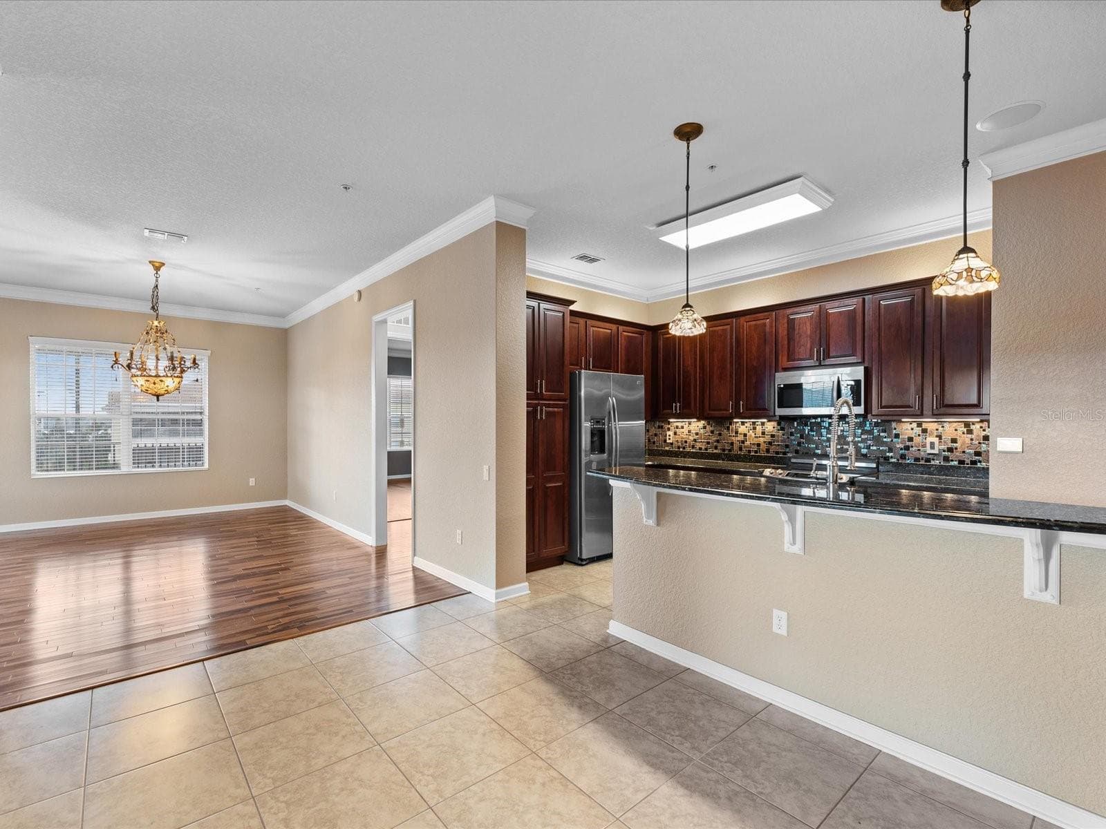 greatroom - 3356 ROBERT TRENT JONES DR #407, ORLANDO