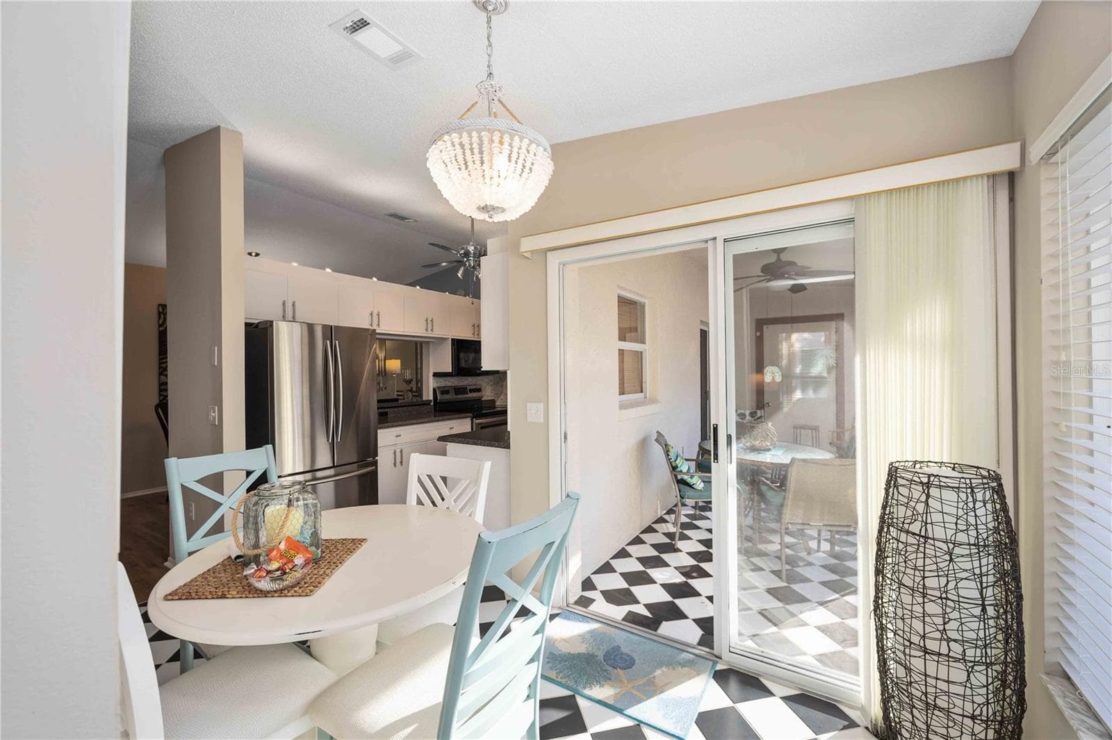 Sliding Glass Doors to Covered Patio with Screened In Open Area - 7206 29TH AVENUE DR W #2263, BRADENTON