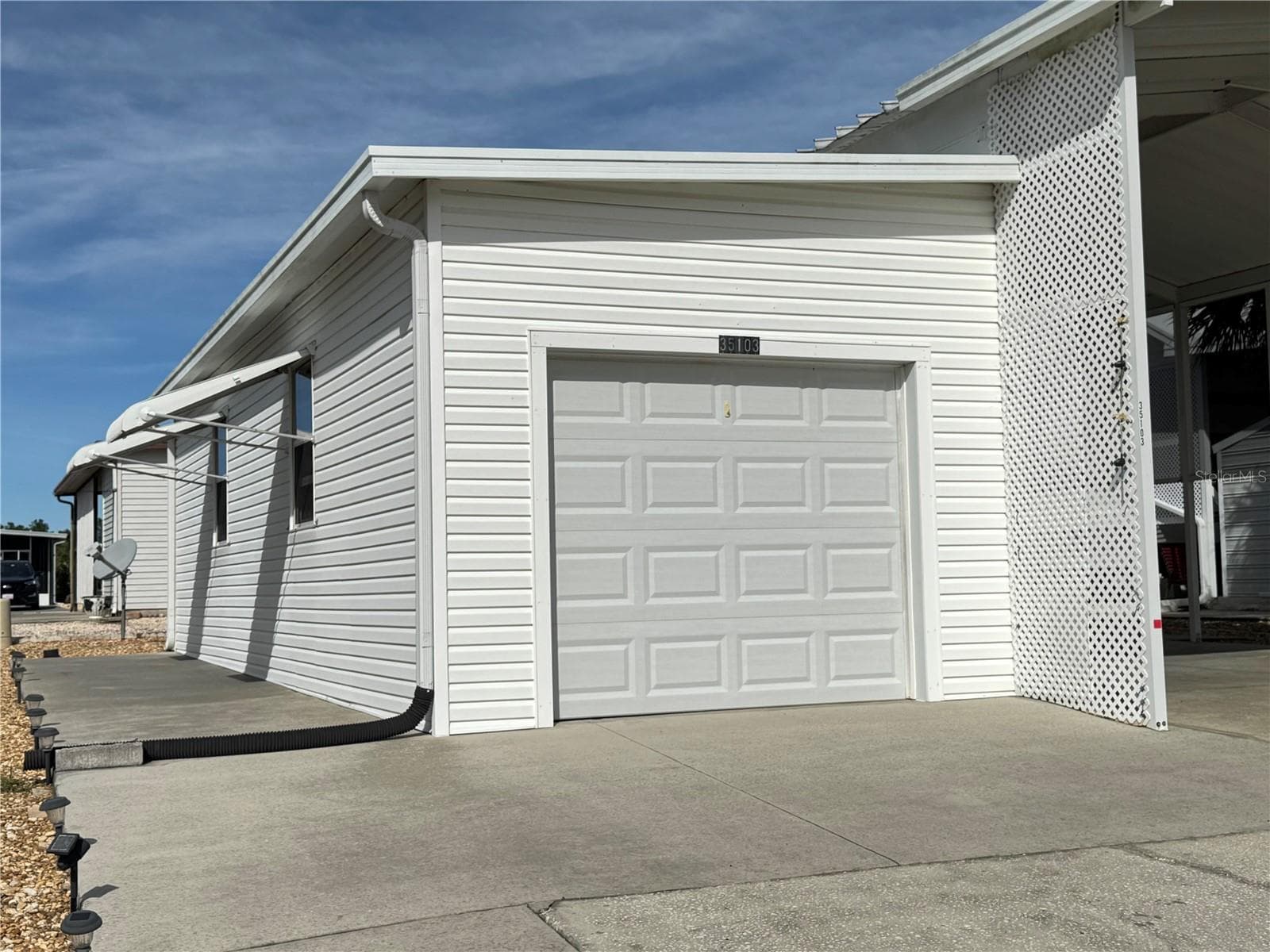 12.5' x 38' Garage with electric & water - 35103 JADE DR, ZEPHYRHILLS