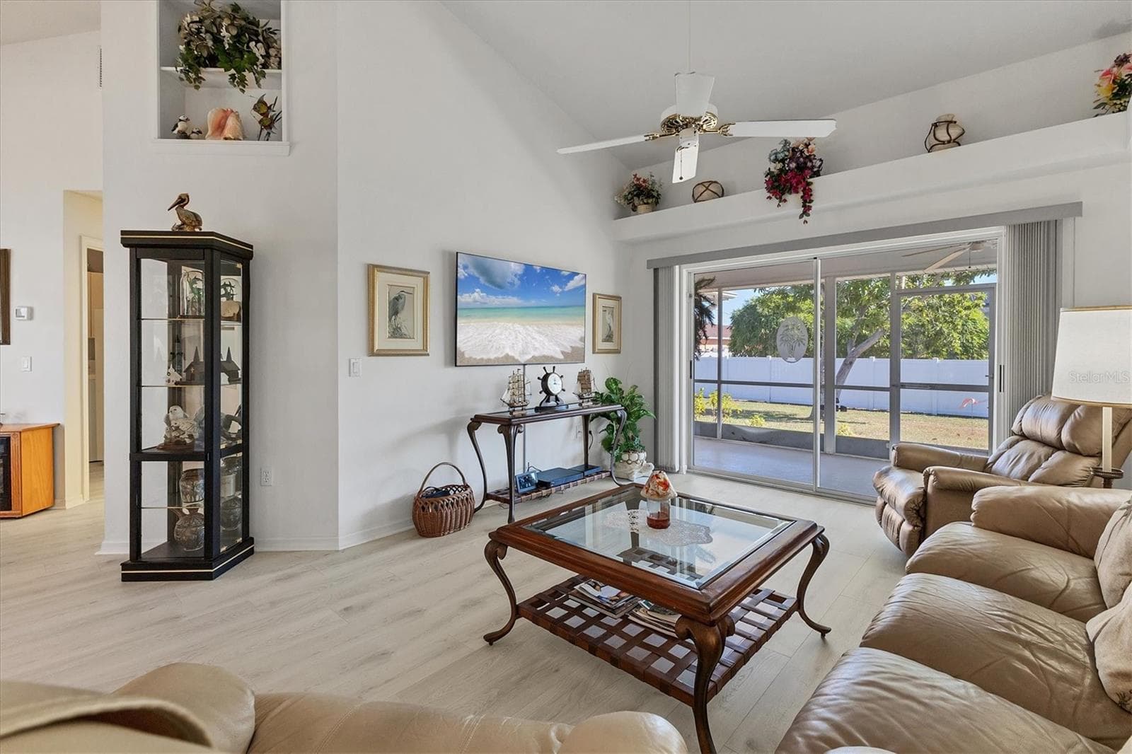 Living room with slider to lanai - 2720 S BISCAYNE DR, NORTH PORT