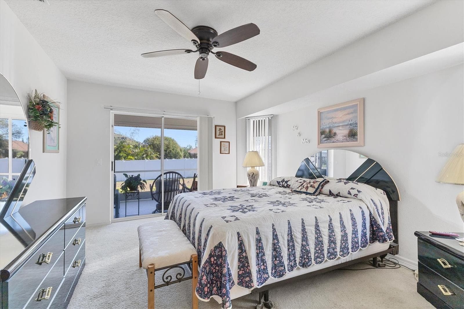 Primary bedroom with slider to lanai - 2720 S BISCAYNE DR, NORTH PORT