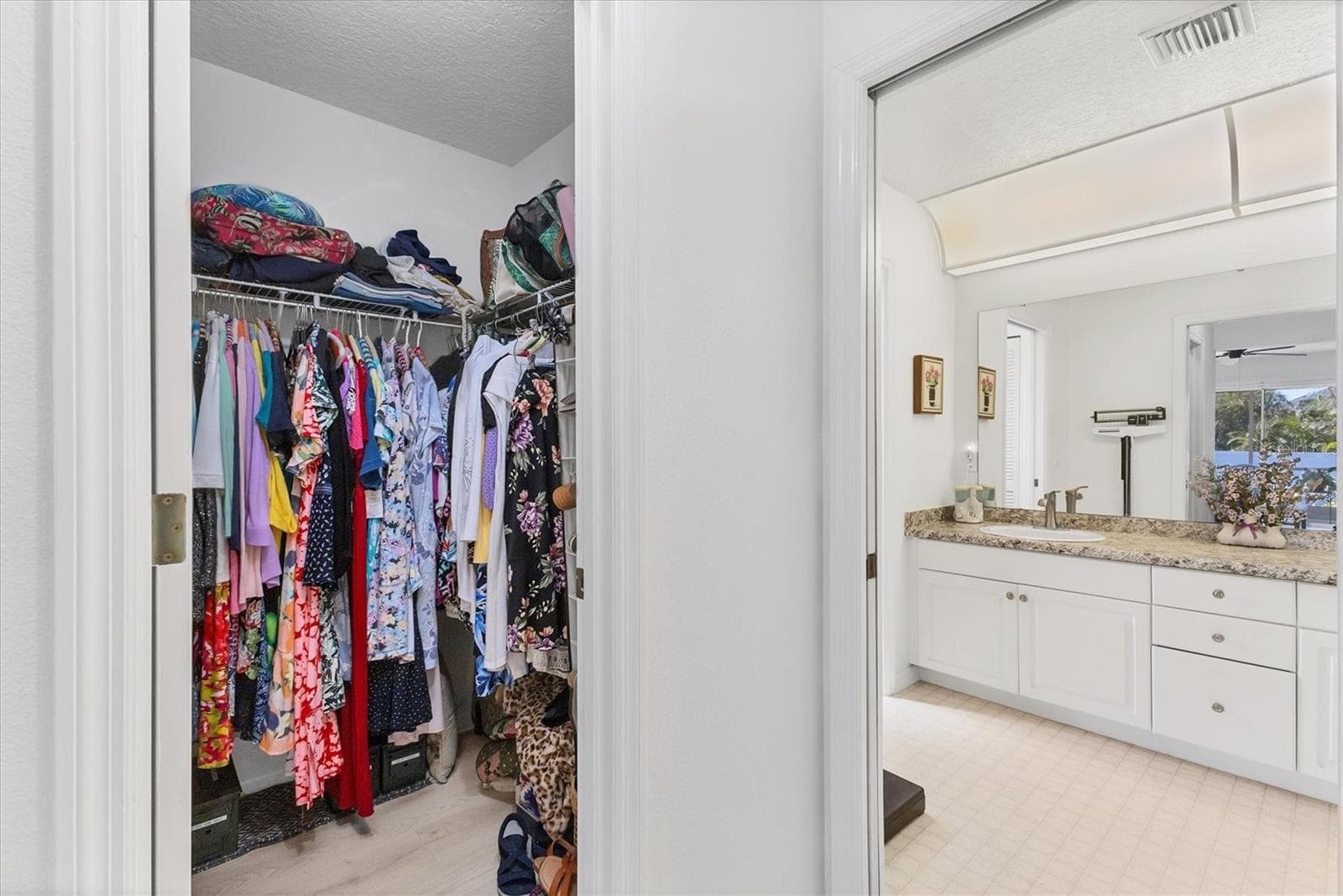 Walk-in closet, primary bathroom - 2720 S BISCAYNE DR, NORTH PORT
