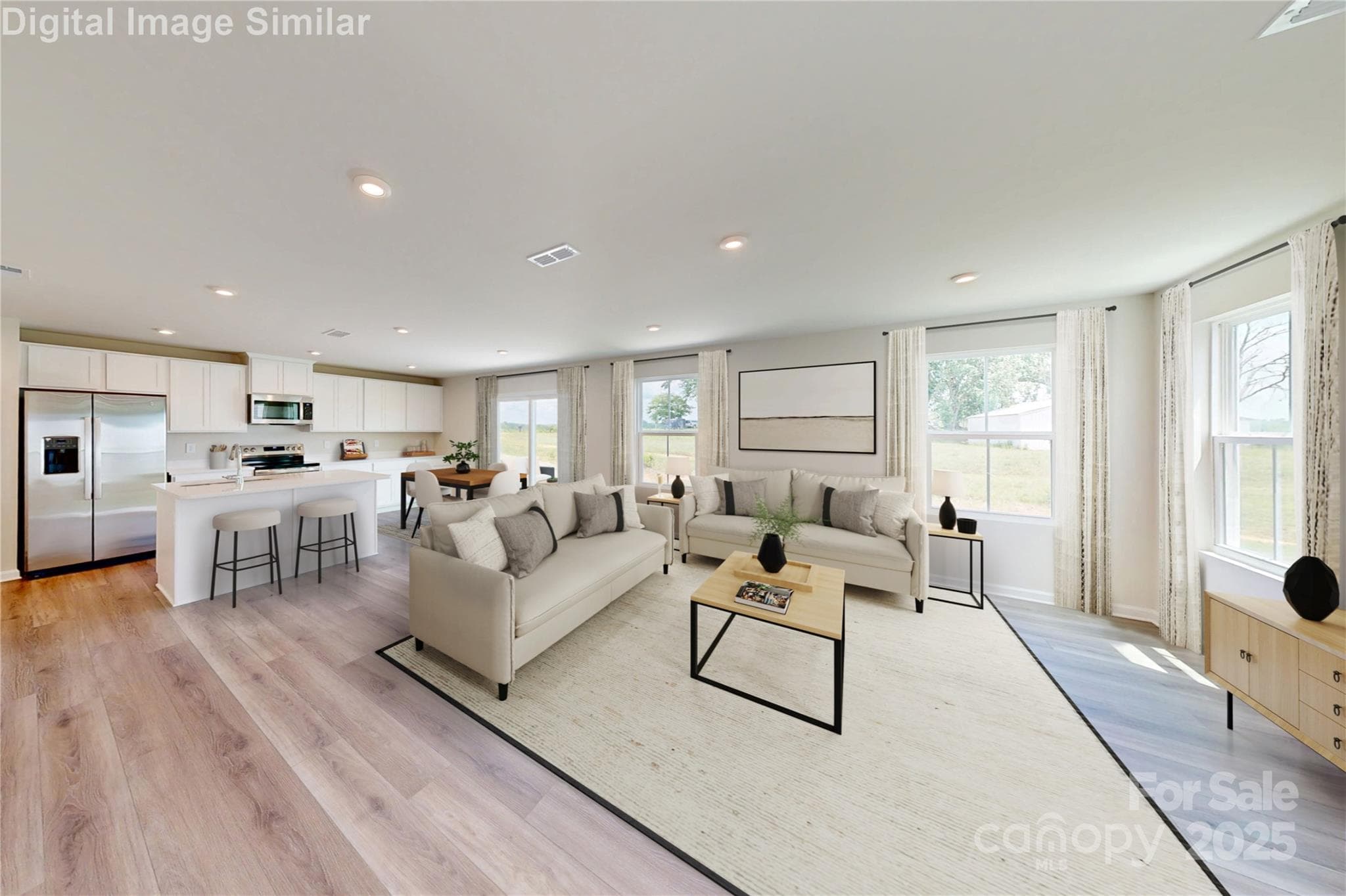 Wide open spaces, sunshine galore! This kitchen and great room combo is bursting with light, style, and room to live your best life! - 5232 McCallum Meadows Drive, Charlotte