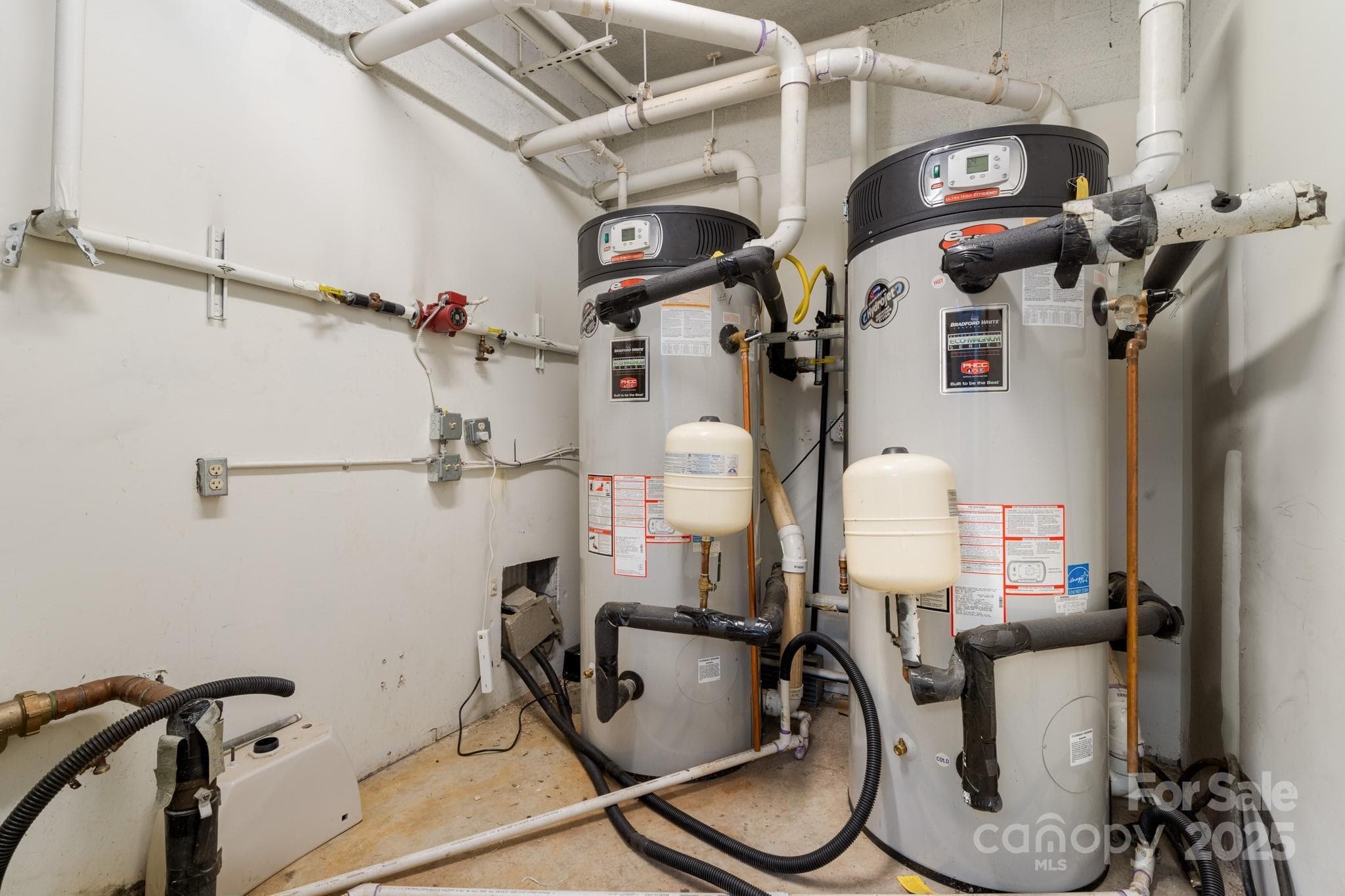 Water Heater Room. Water Heaters are 100 Gallons each, enough space in the room for two more units. - Hendersonville