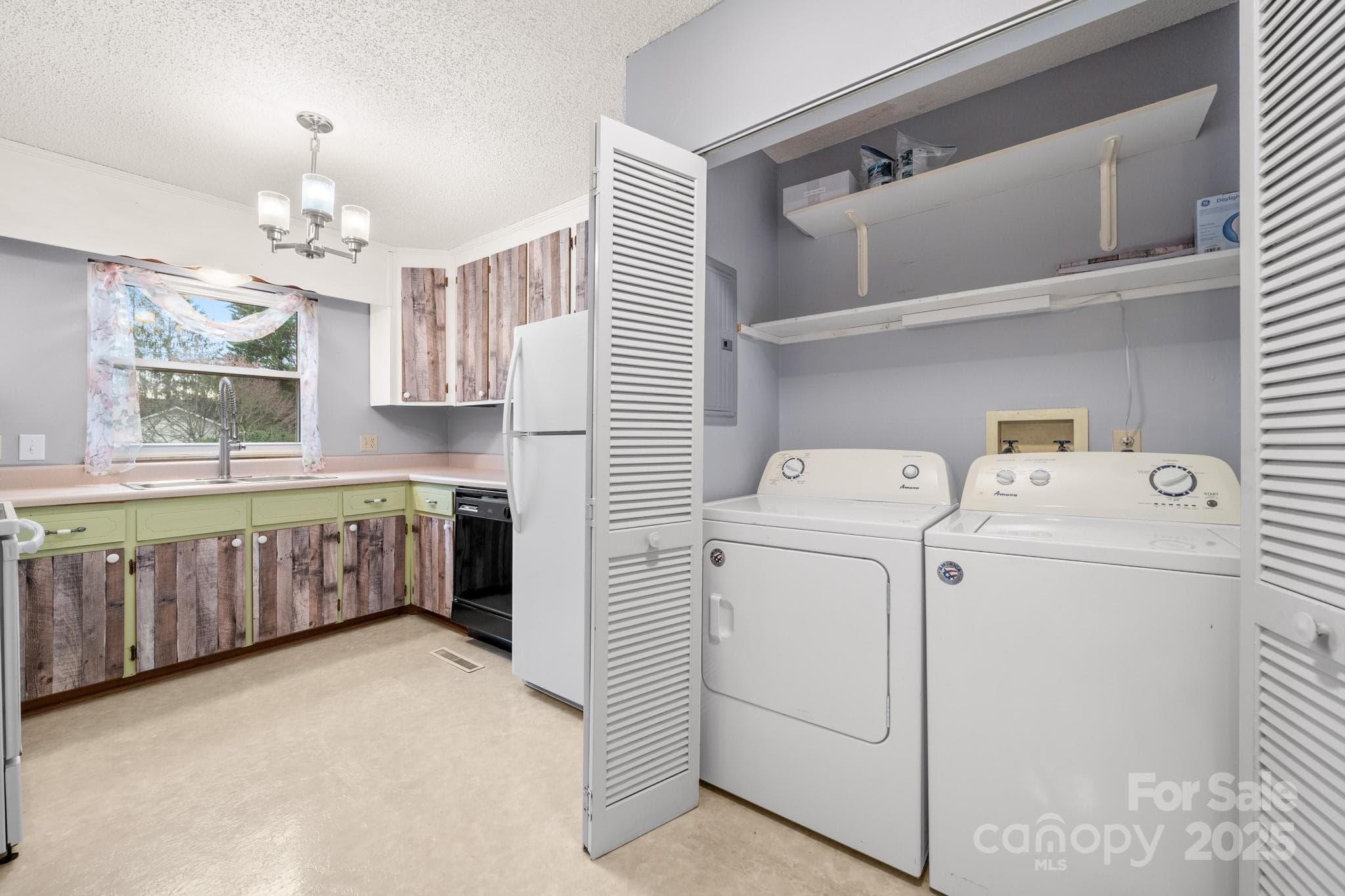 Laundry Room adjacent to Kitchen - 27 Capri Lane, Hendersonville