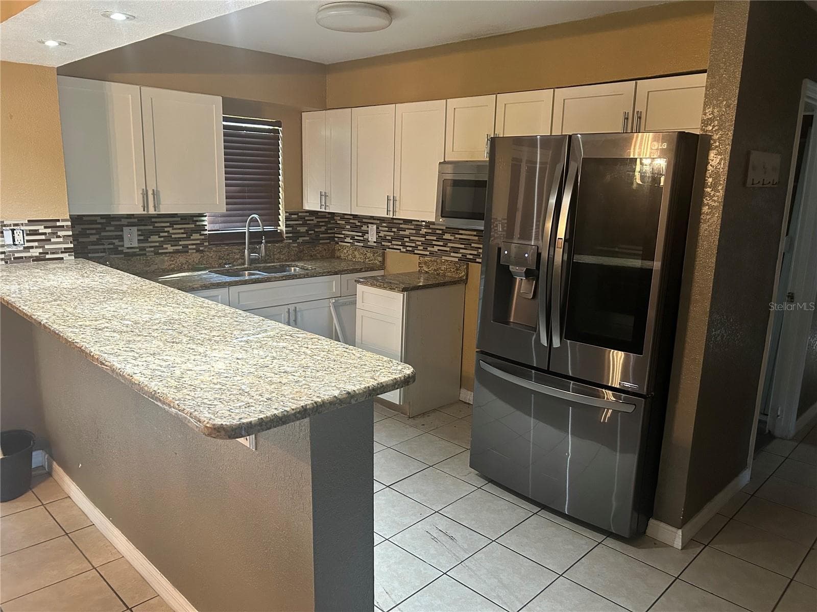 Single Family Residence at 1121 ORANGE AVE, SANFORD, photo 8 of 35