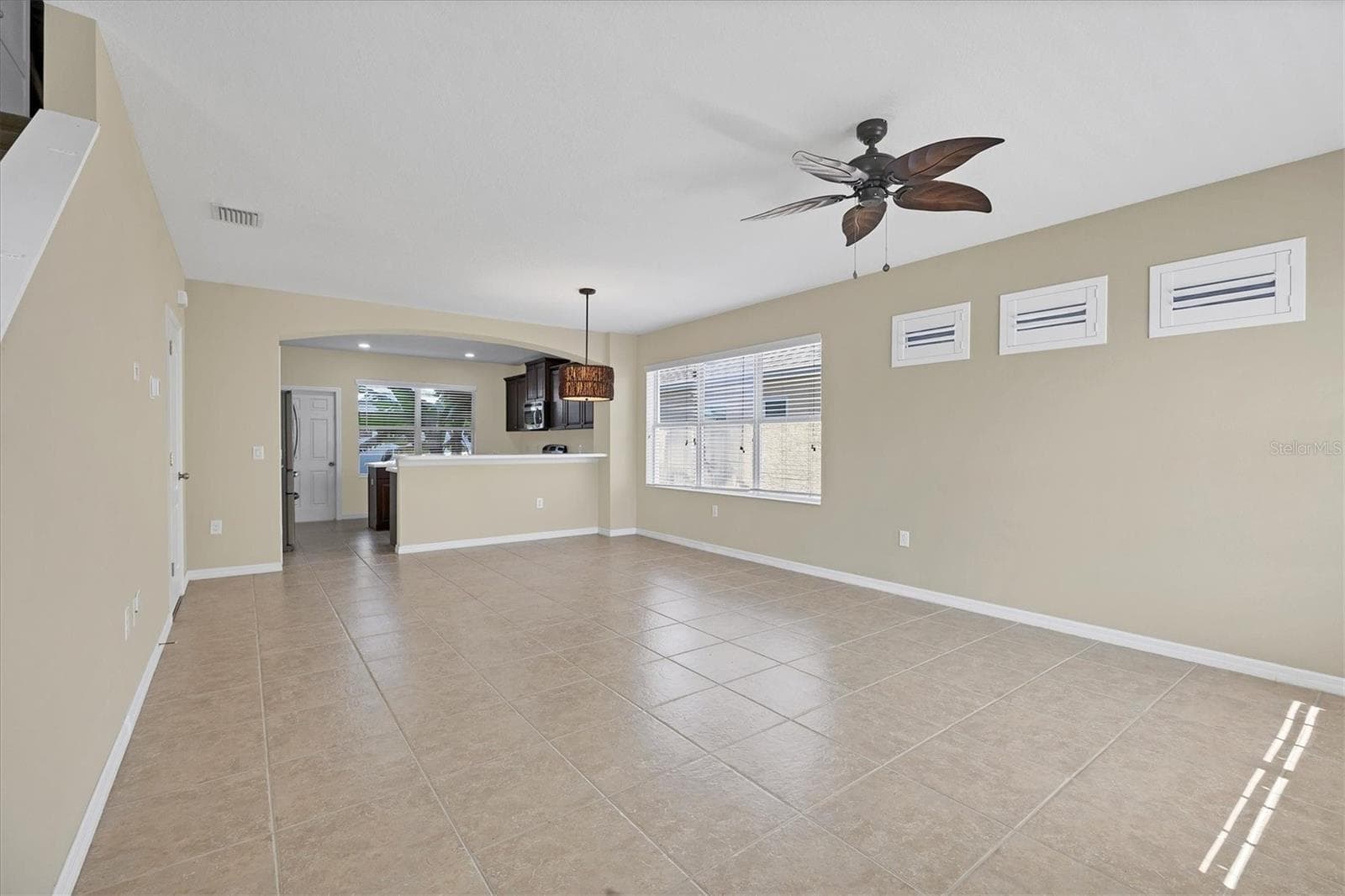 Kitchen opens to great room - 4811 WOODBROOK DR, SARASOTA