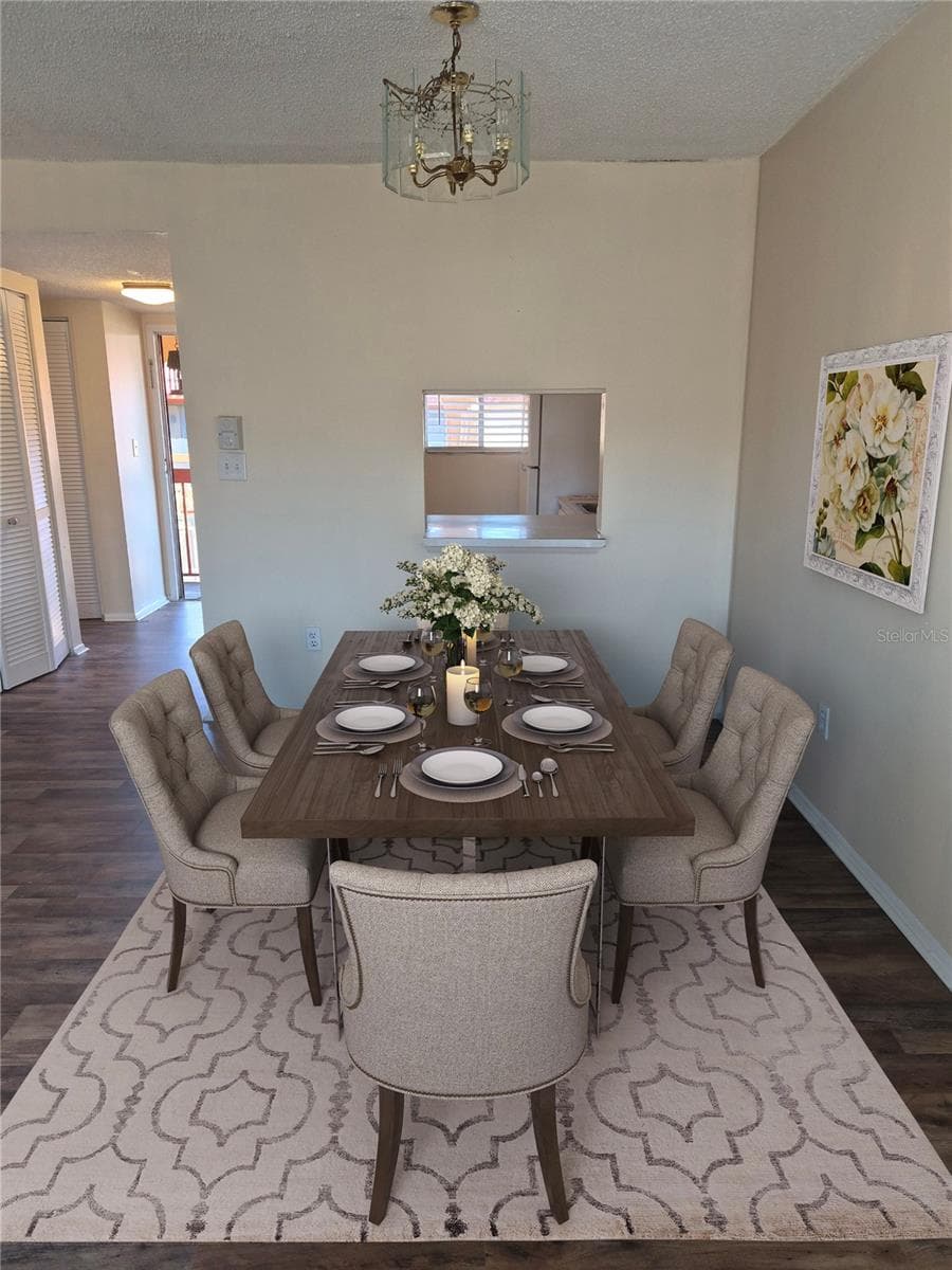 Dining area-virtual staging - 2860 N POWERS DR #133, ORLANDO