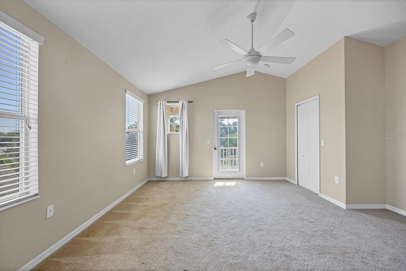 Primary Ensuite Bedroom has access ti second floor front porch - 4811 WOODBROOK DR, SARASOTA