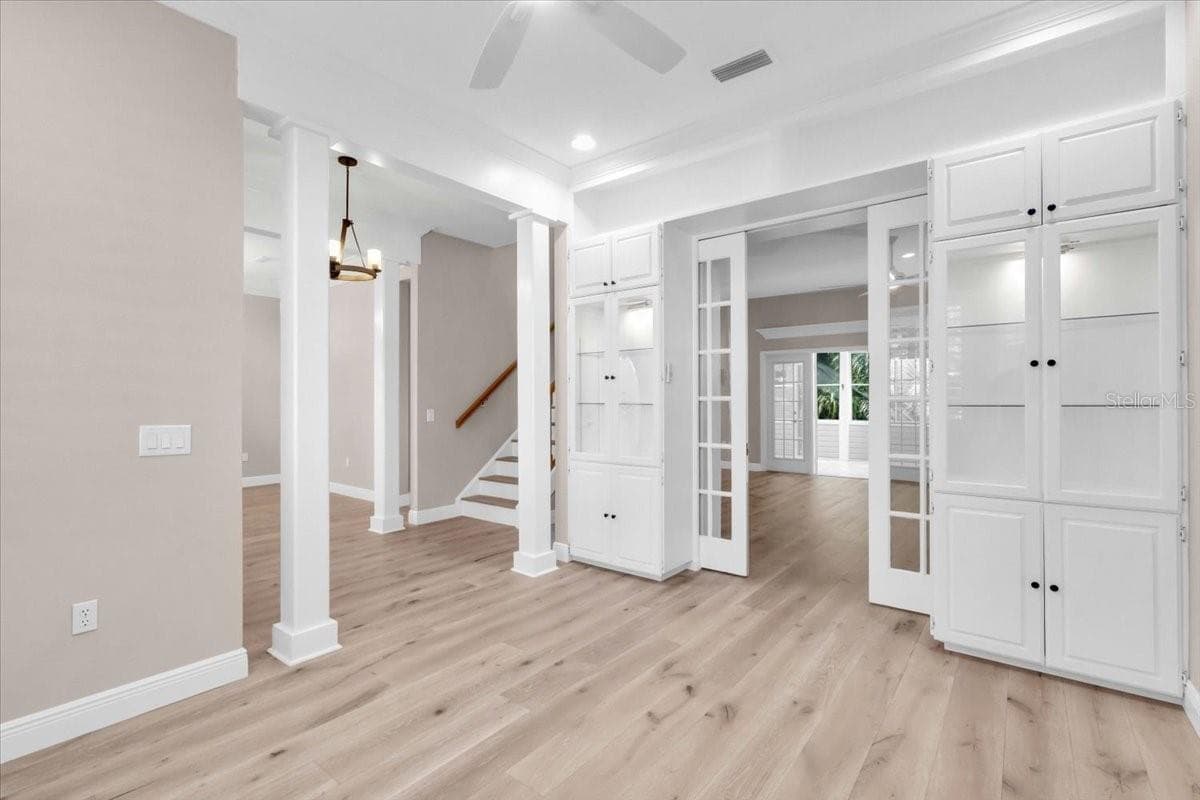 Close the pocket doors to reduce the noise between the living room and office. Gorgeous built ins for your treasures. - 2306 64TH ST W, BRADENTON