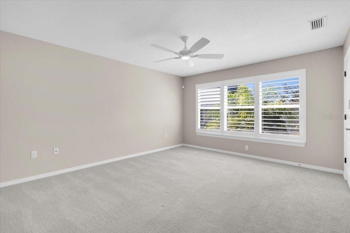 Master suite is flooded with light. - 2306 64TH ST W, BRADENTON