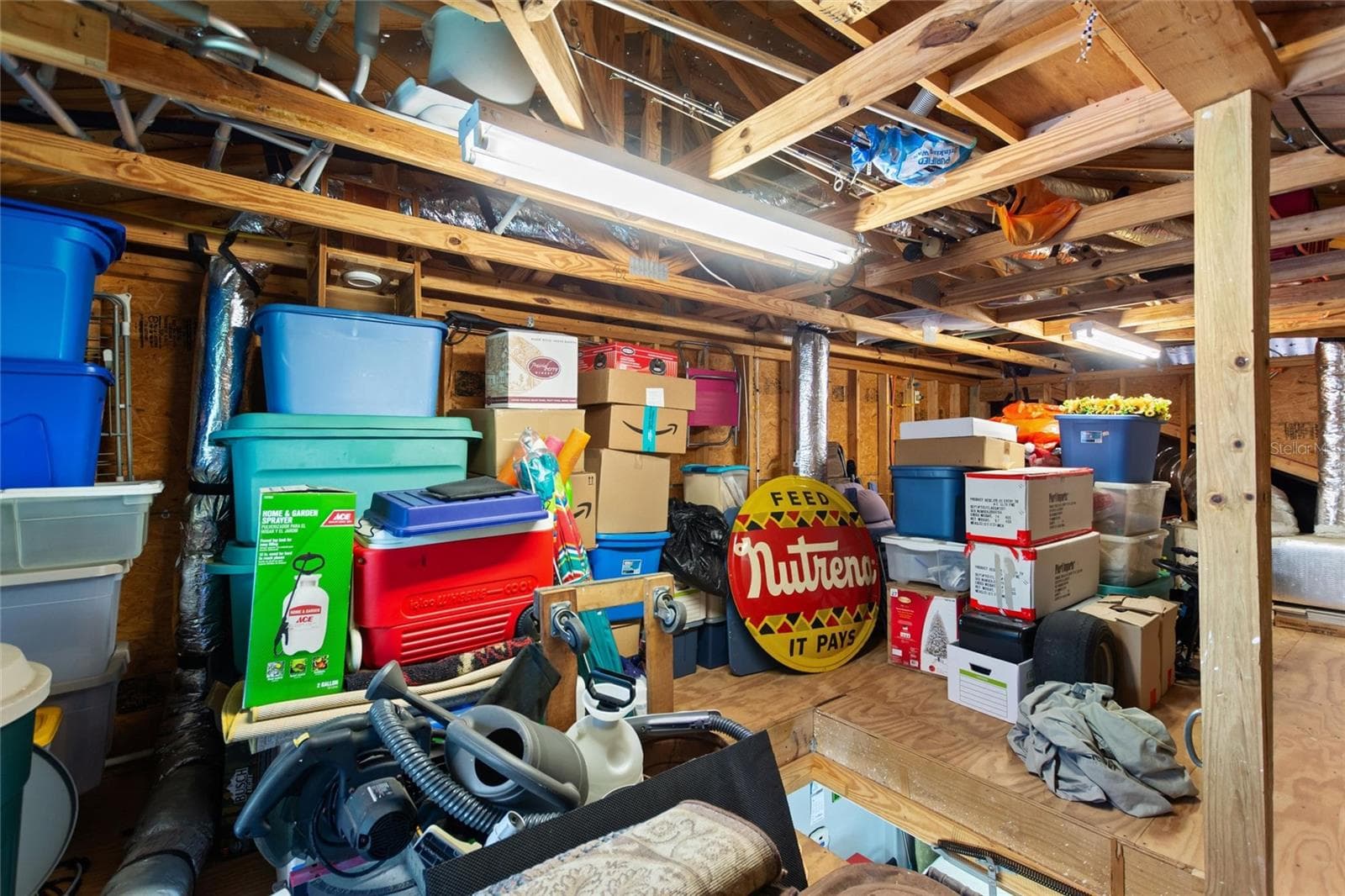 storage room above Laundry/storage room - 548 NARROW POND RD, POLK CITY