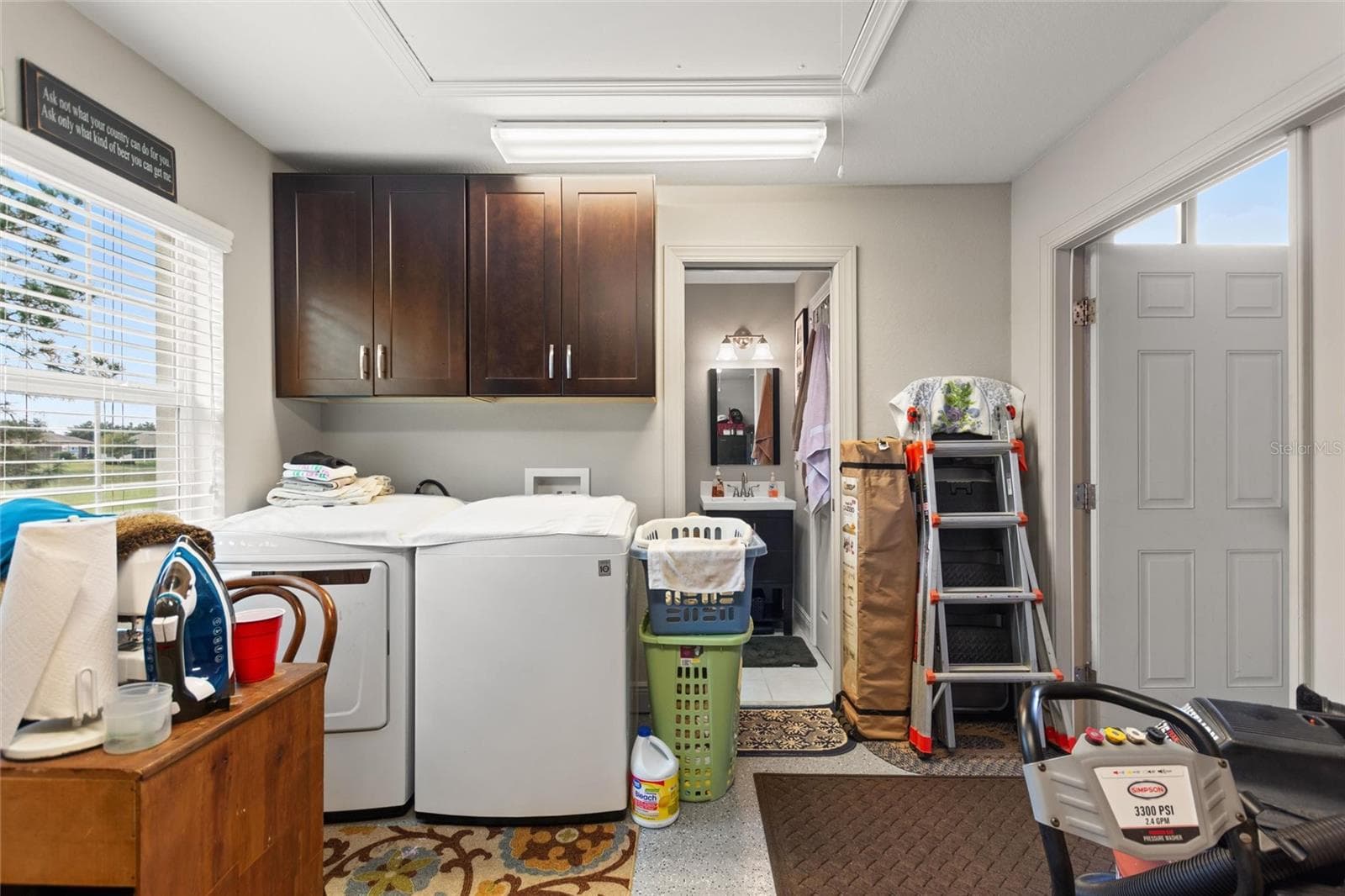 laundry room with bath - 548 NARROW POND RD, POLK CITY