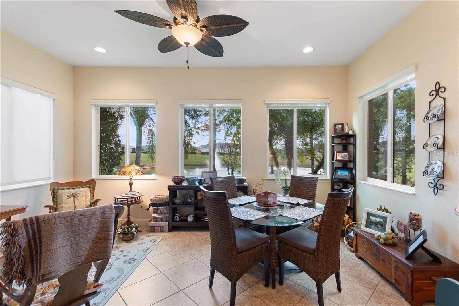 Enclosed Lania looking out onto pond with water fountain - 548 NARROW POND RD, POLK CITY