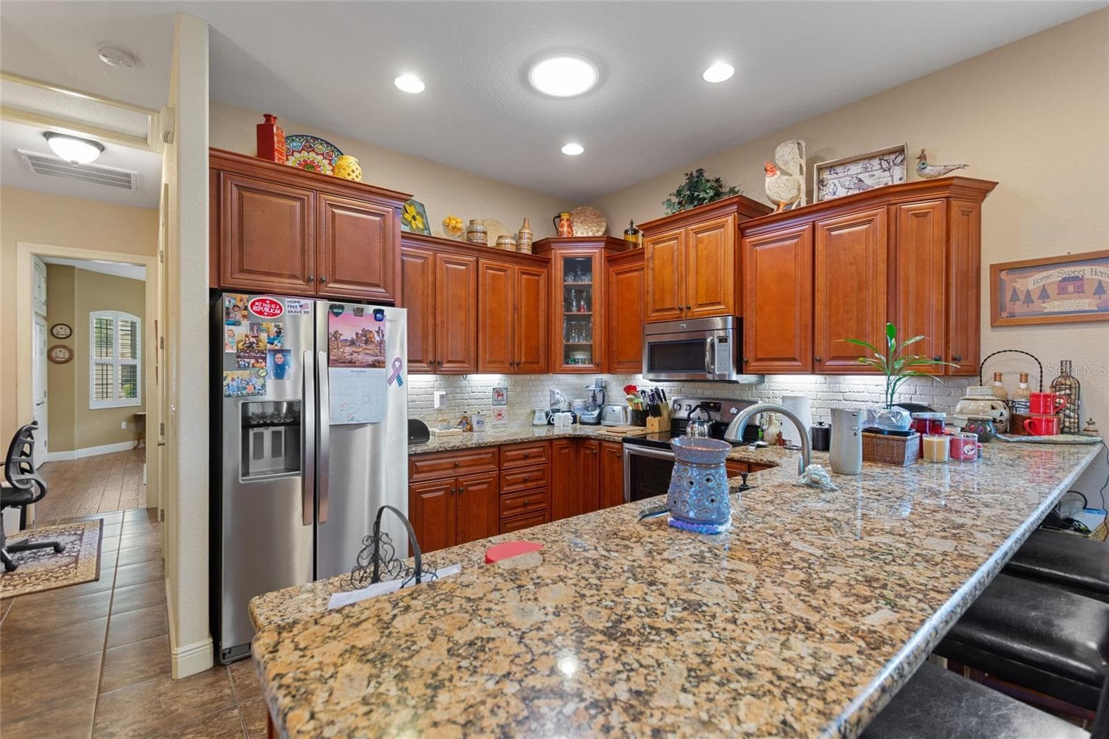 Kitchen at the entry door off of the RV Port - 548 NARROW POND RD, POLK CITY