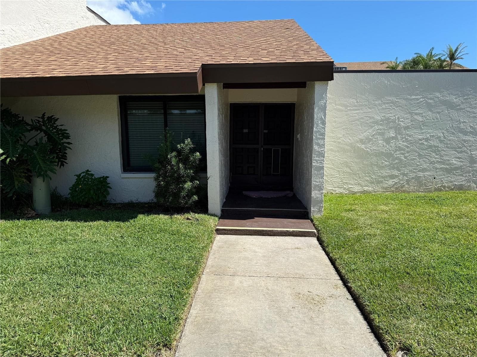 Front double door entry. - 2207 BELLEAIR RD #B22, CLEARWATER