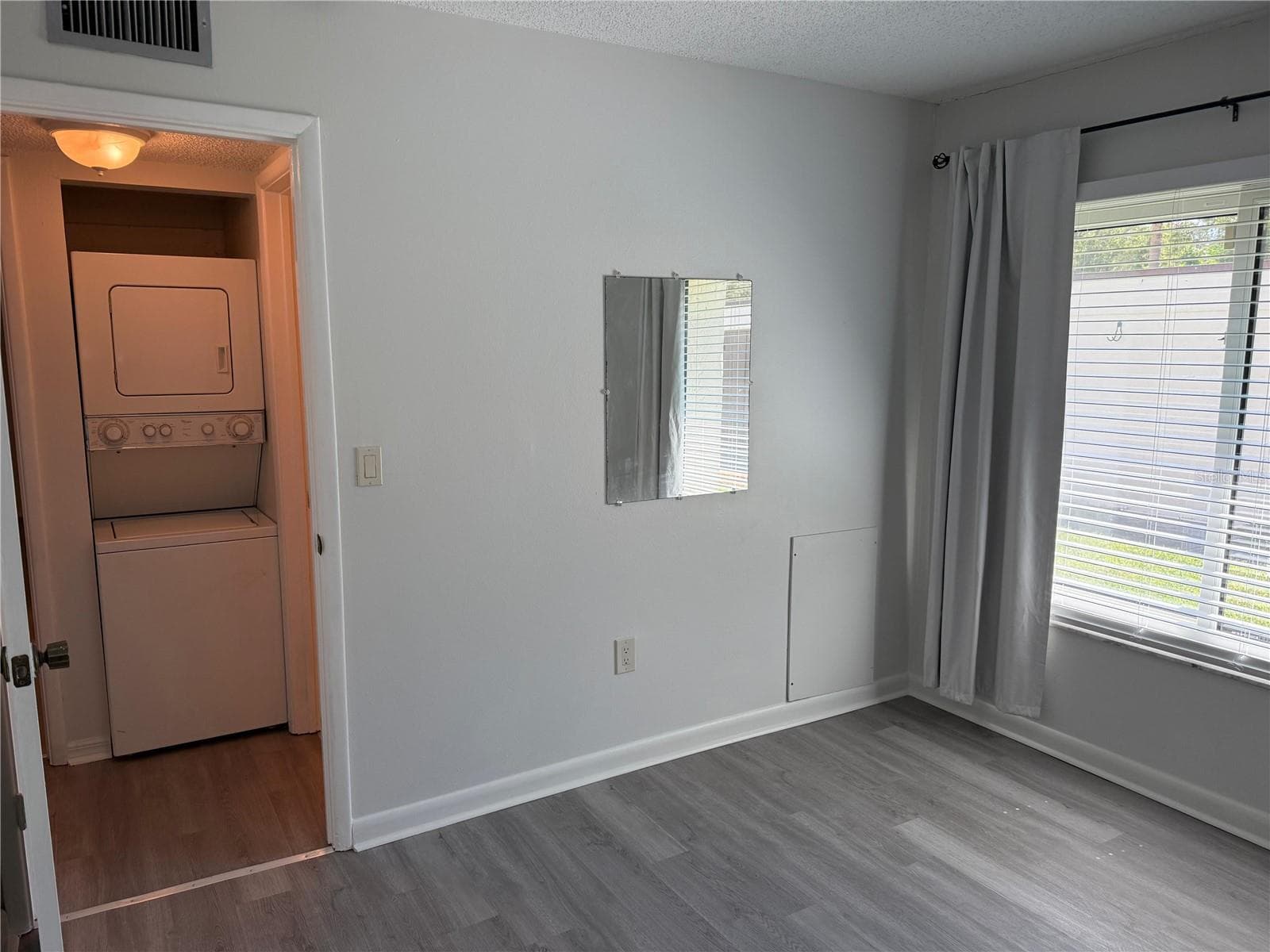 2nd bedroom with the guest bath just around the corner to the right. Good Location for the washer and dryer. - 2207 BELLEAIR RD #B22, CLEARWATER