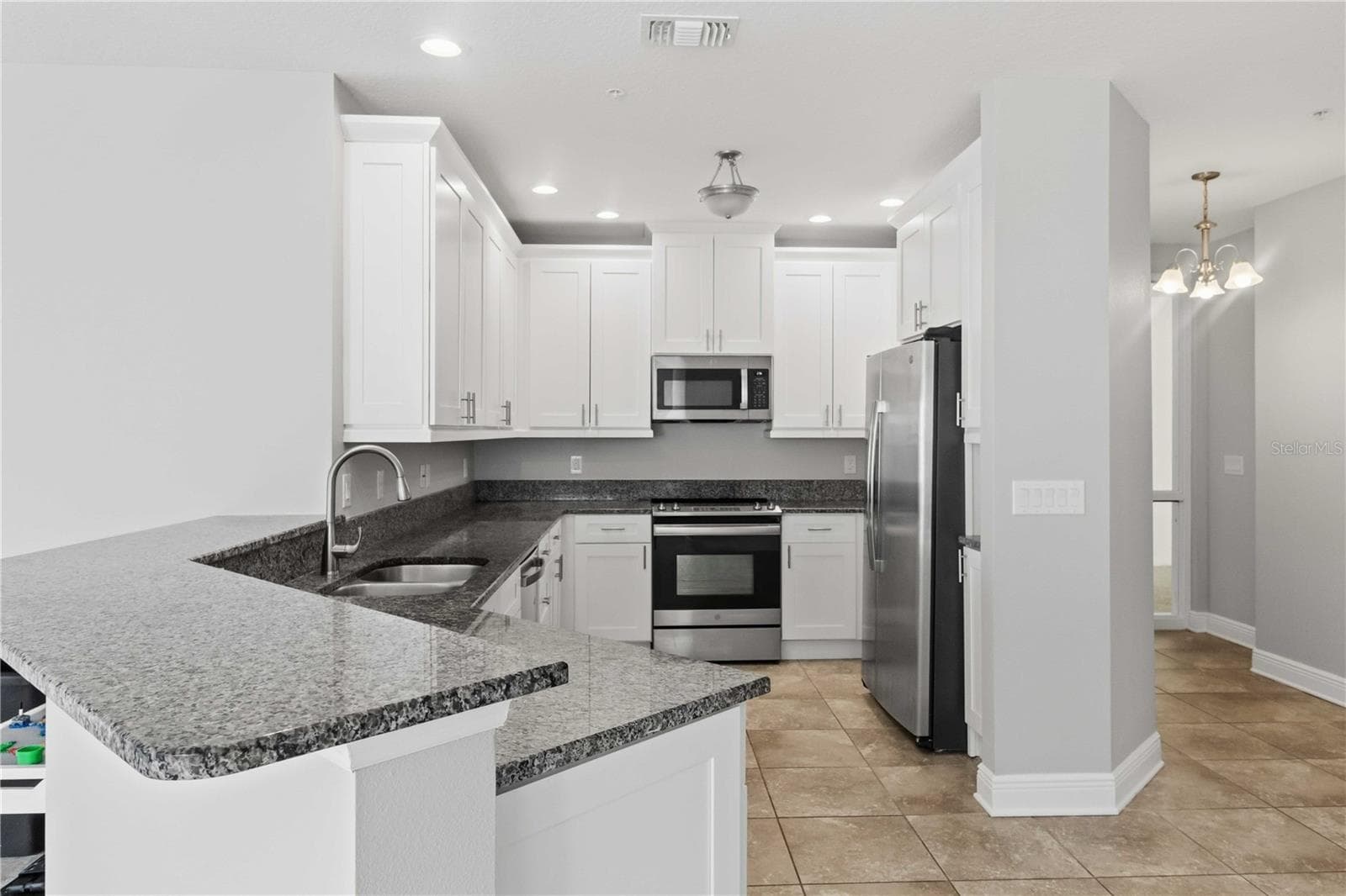 Raised breakfast bar. - 3418 79TH STREET CIR W #101, BRADENTON