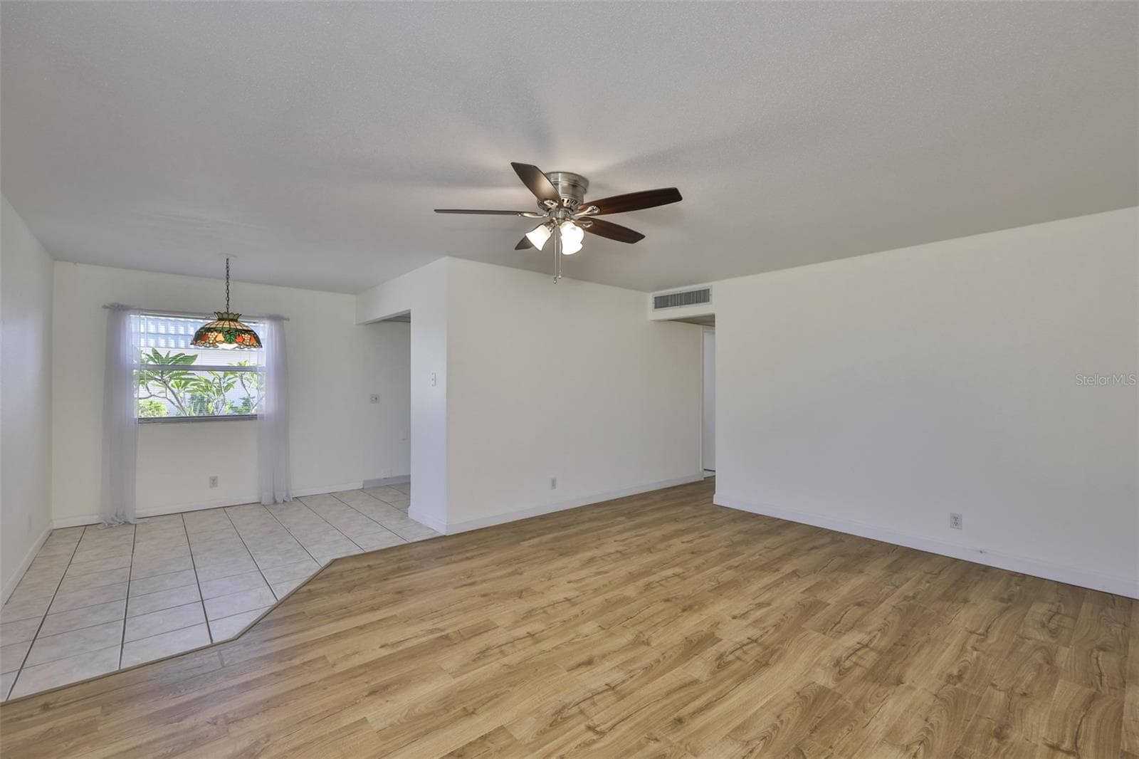 View to dinette from living room - 1811 BEDFORD LN #153, SUN CITY CENTER