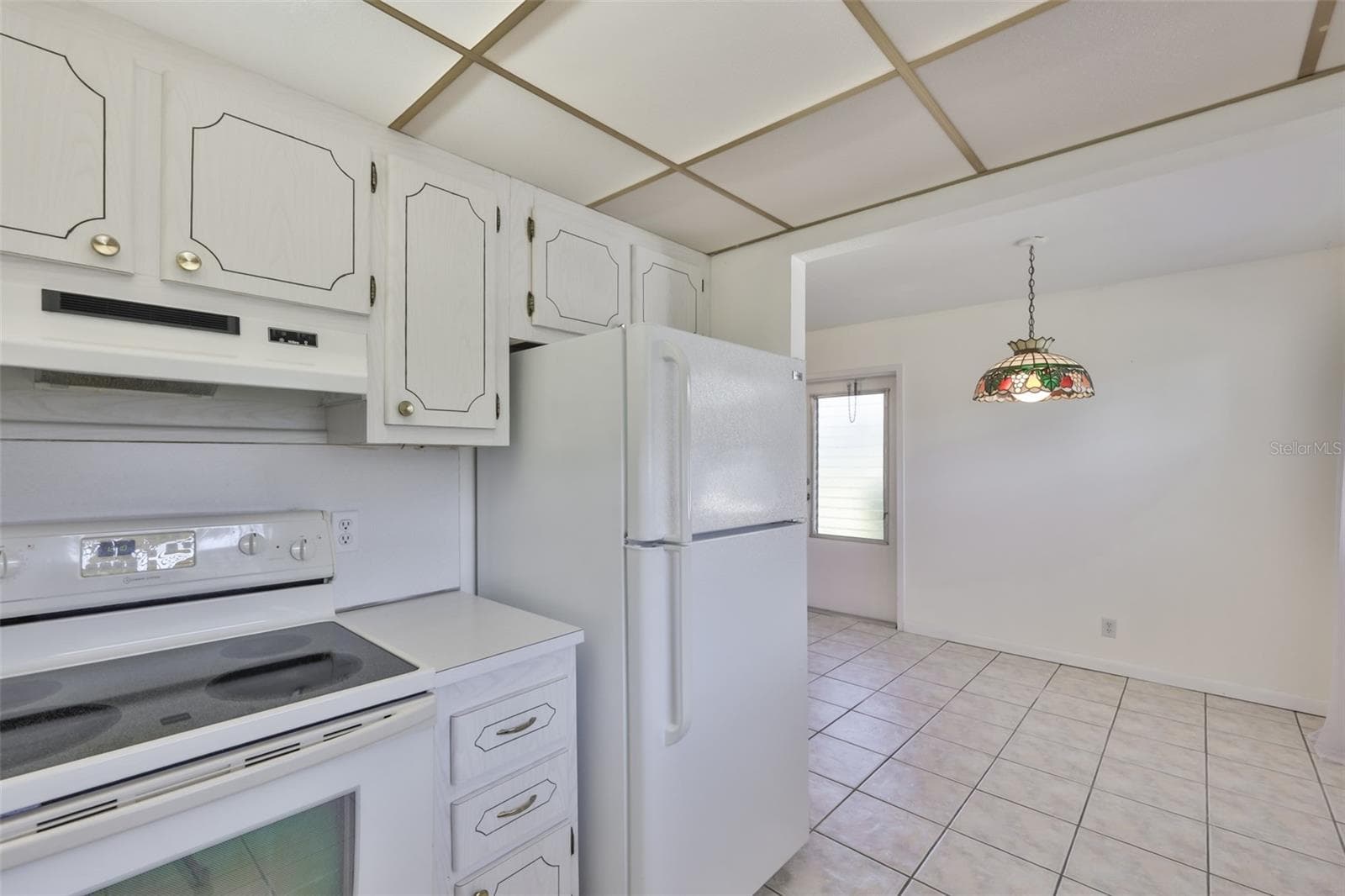 Dinette from kitchen - 1811 BEDFORD LN #153, SUN CITY CENTER
