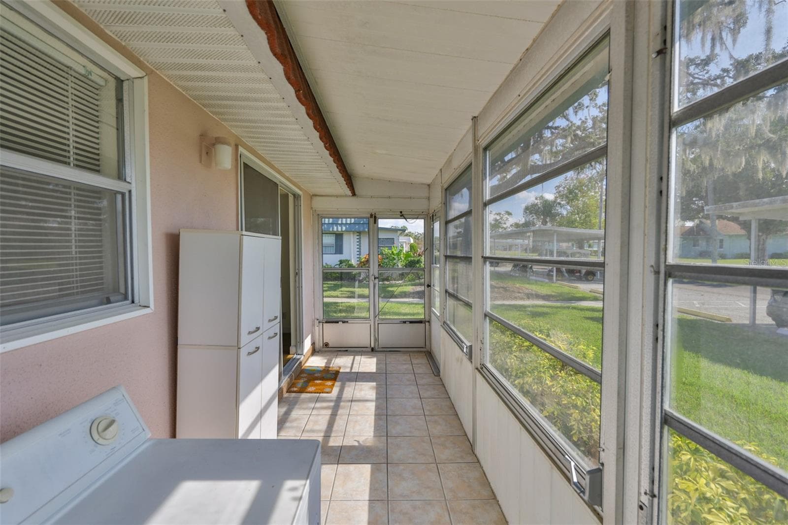 Florida Room, golf cart doors, rear door - 1811 BEDFORD LN #153, SUN CITY CENTER