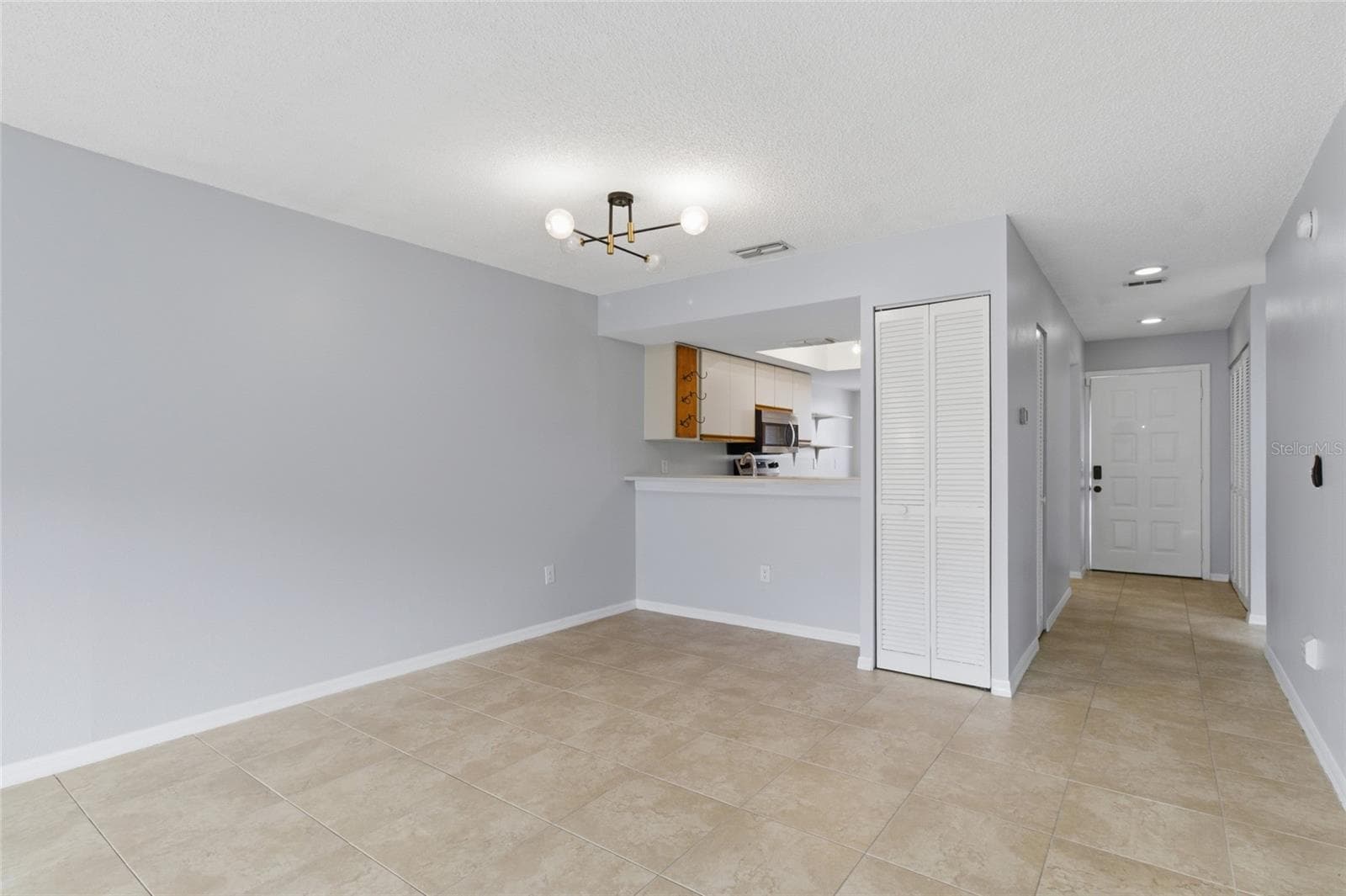 Living Room dining rm combo - 2701 COUNTRYSIDE BLVD #102, CLEARWATER