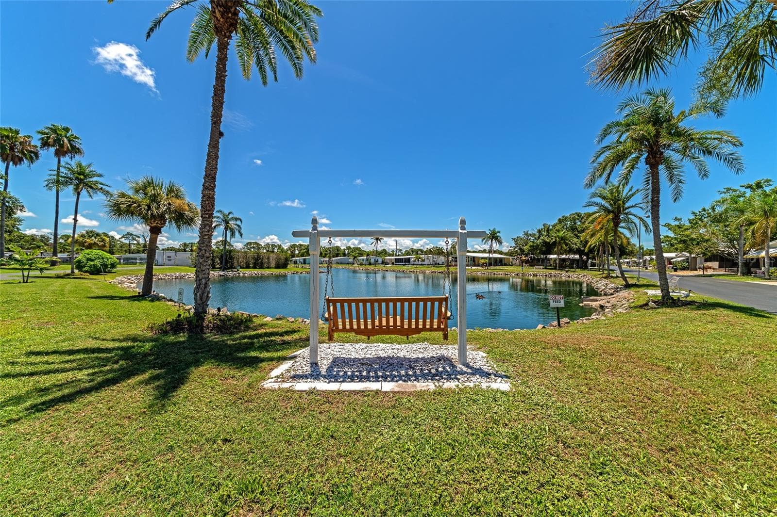 Just imagine sitting here...watching the water and the palm trees ..and being so glad you moved here! - 348 TROPIC DR, OSPREY