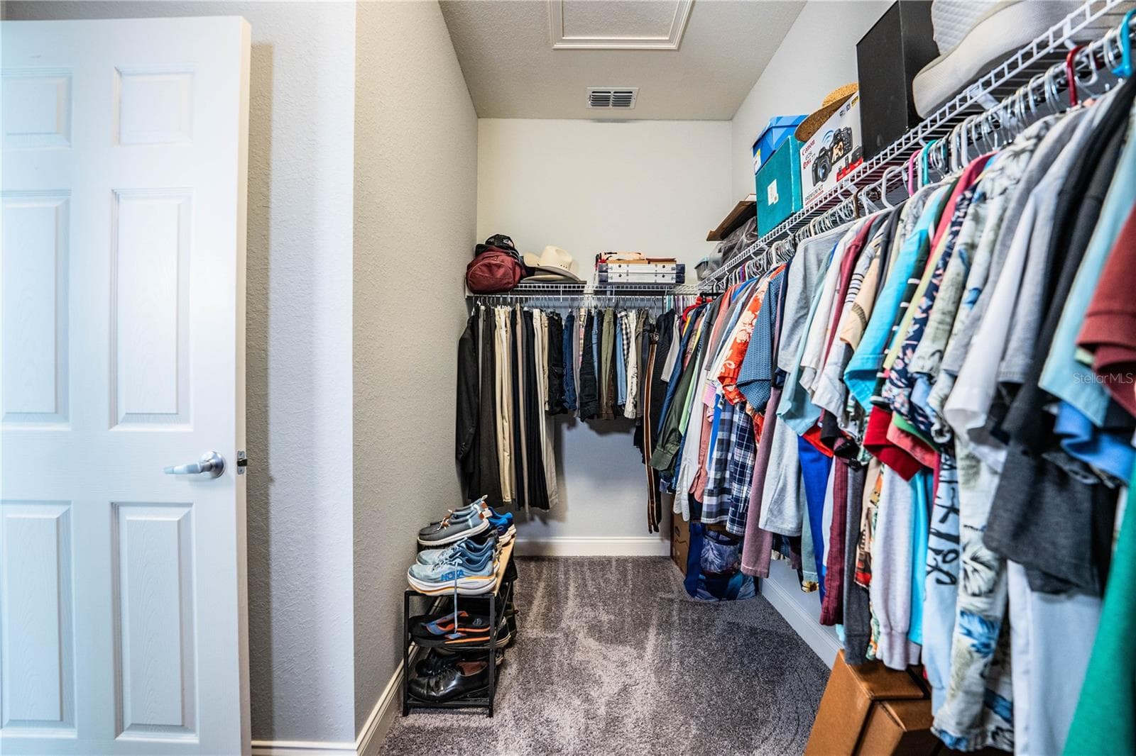 Primary walk in closet - 261 WALKERS POINT DR, AUBURNDALE