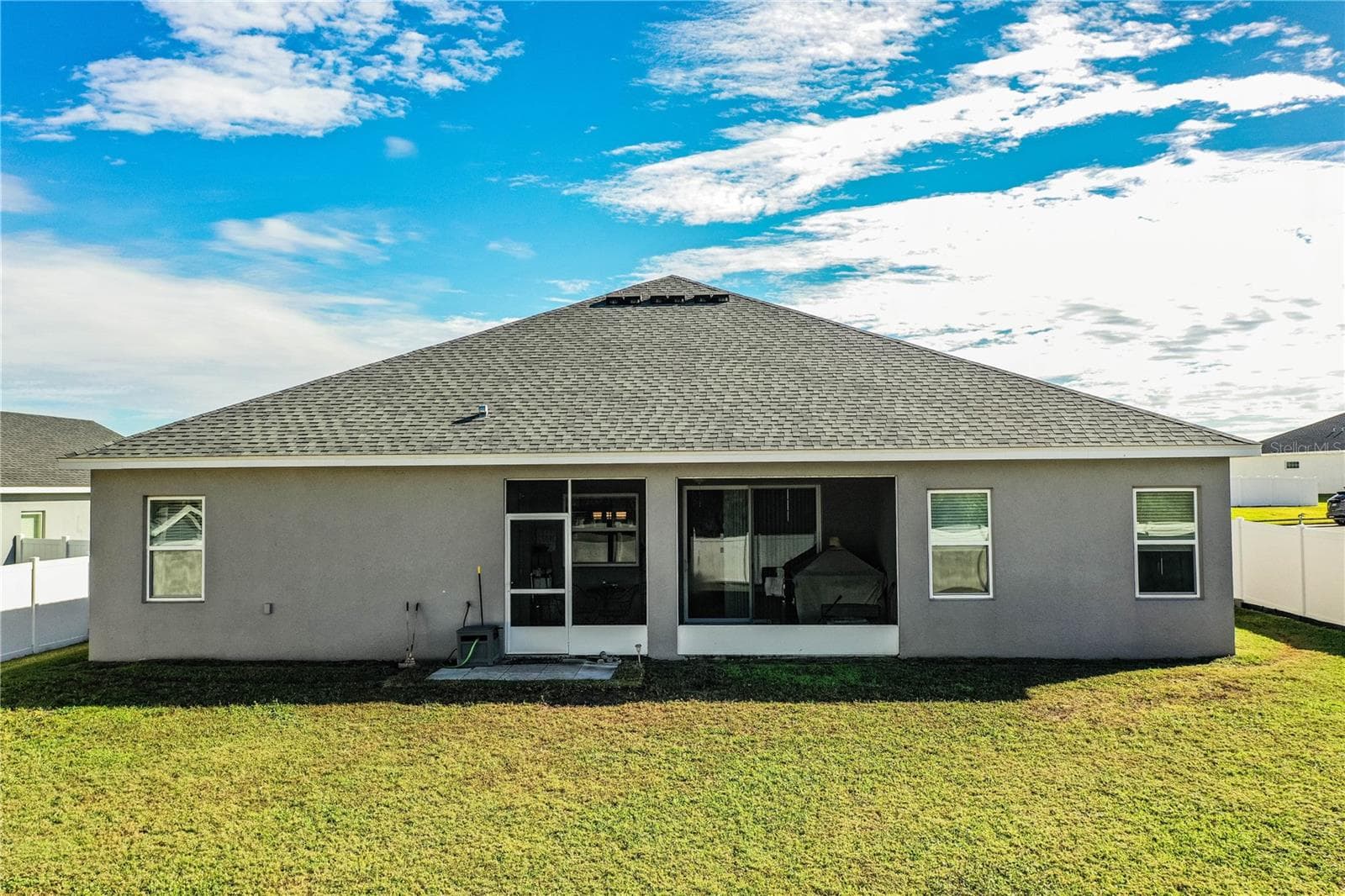 Rear of home - 261 WALKERS POINT DR, AUBURNDALE