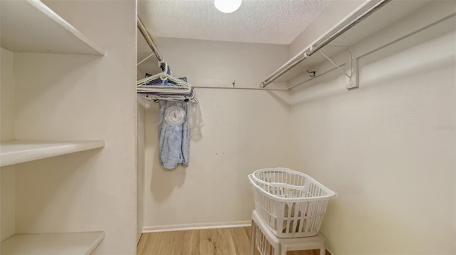Walk-in closet - 8773 MIDNIGHT PASS RD #102G, SARASOTA