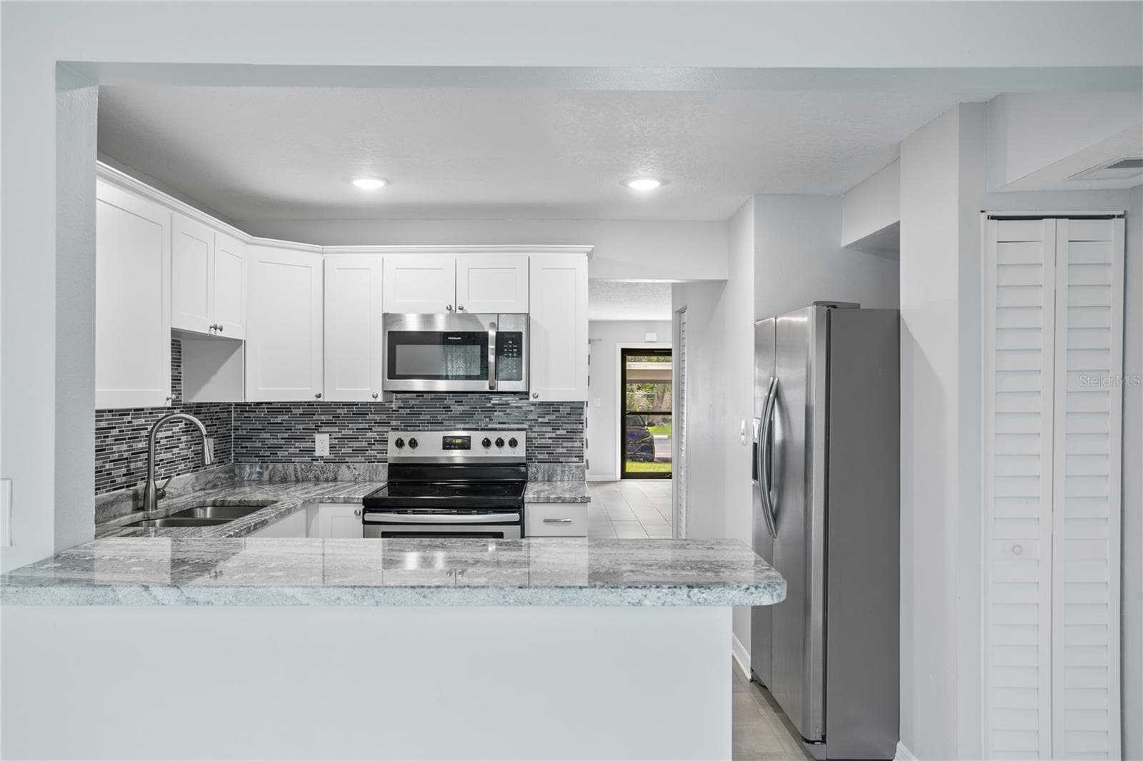 Condominium at 4920 LOCUST ST NE #115, ST PETERSBURG, photo 9 of 28