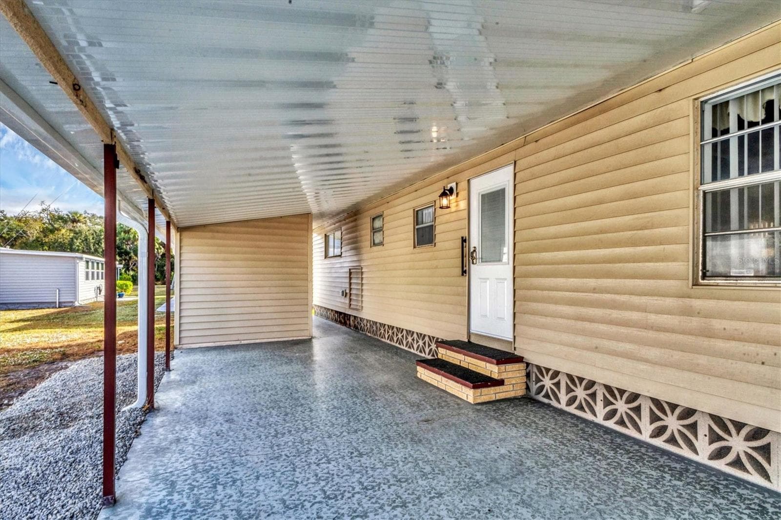 2 car Carport/Outdoor living room space - 1212 45TH AVE E, ELLENTON